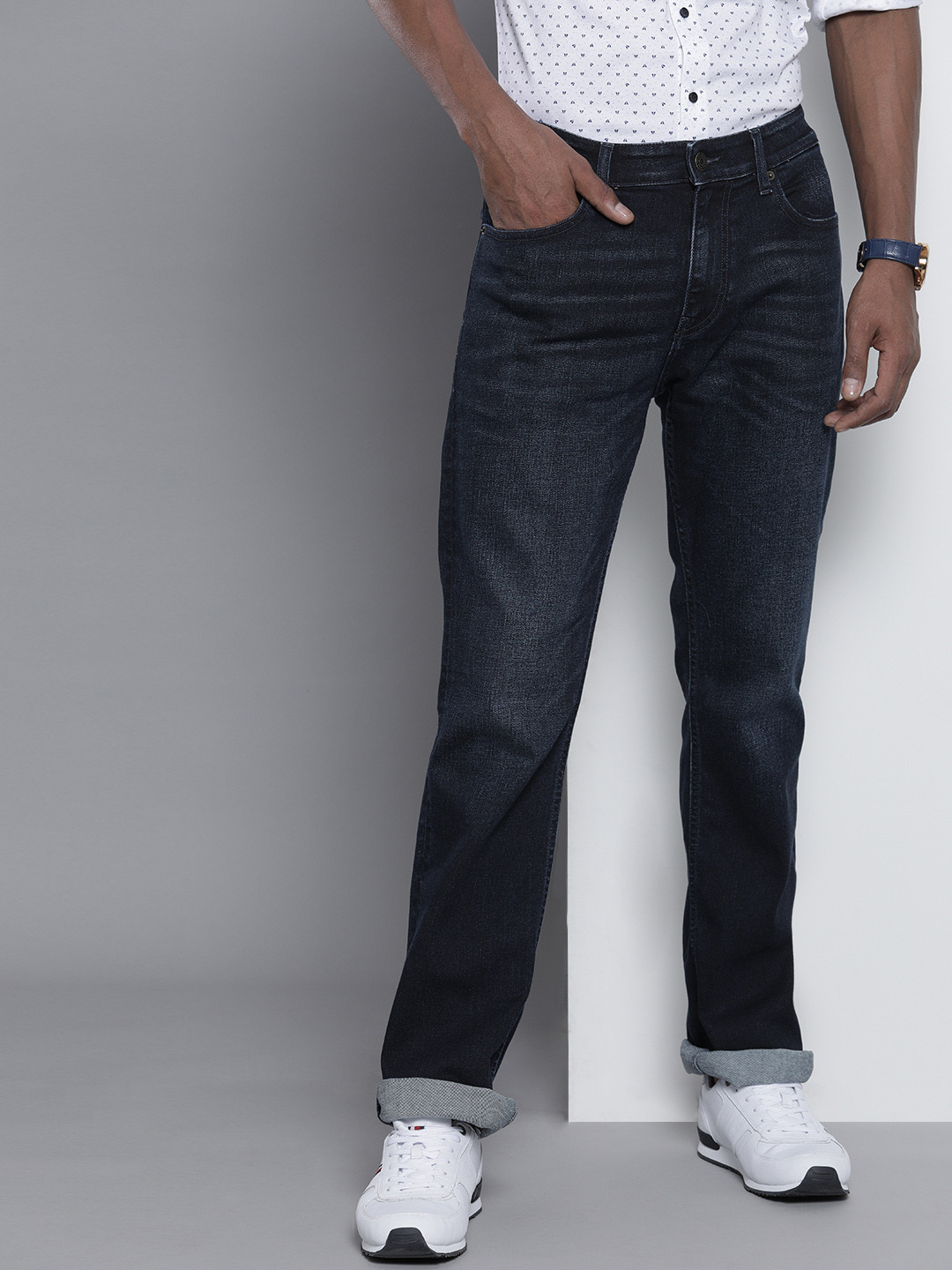 

Tommy Hilfiger Men Blue Ryan Regular Bootcut Light Fade Mid Rise Stretchable Jeans