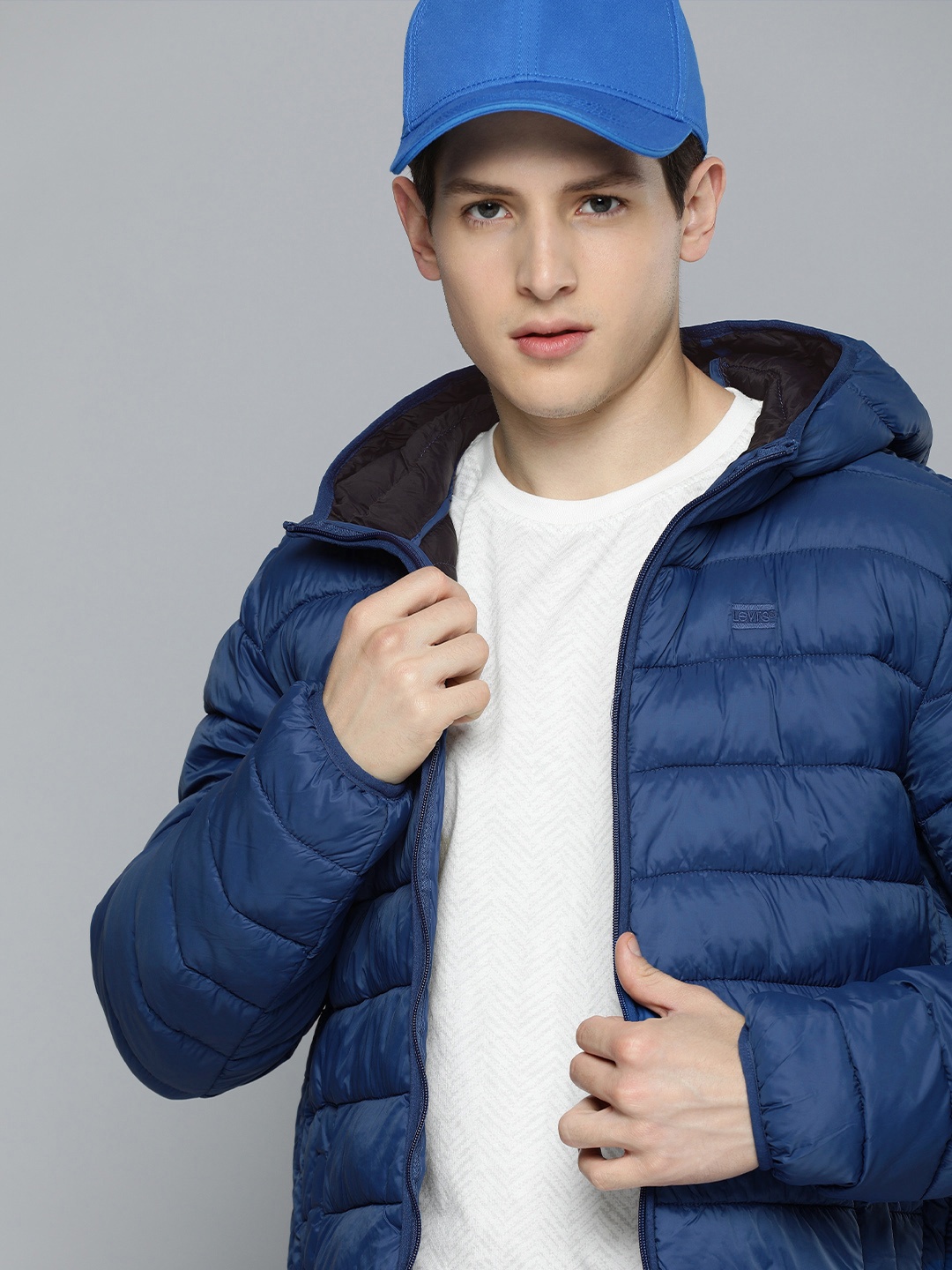 

Levis Men Blue Solid Long Sleeved Hooded Quilted Jacket