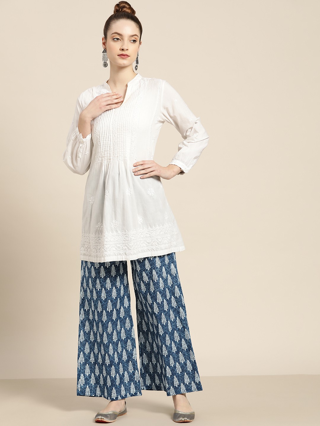 

Moda Rapido Women Blue & White Pure Cotton Ethnic Motifs Print Wide Leg Palazzos