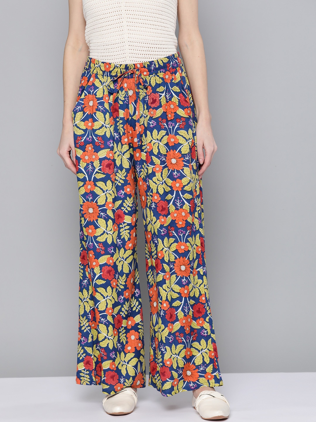 

HERE&NOW Women Navy Blue & Yellow Floral Printed Flared Palazzos