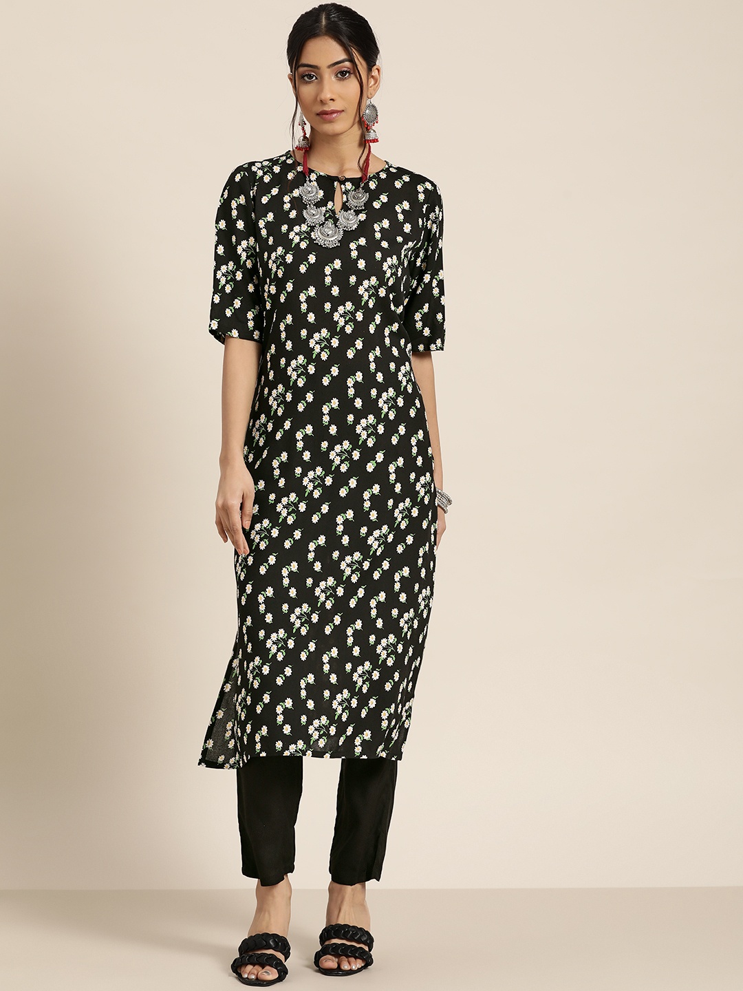 

Moda Rapido Women Black & Off-White Floral Print Kurta with Solid Trousers