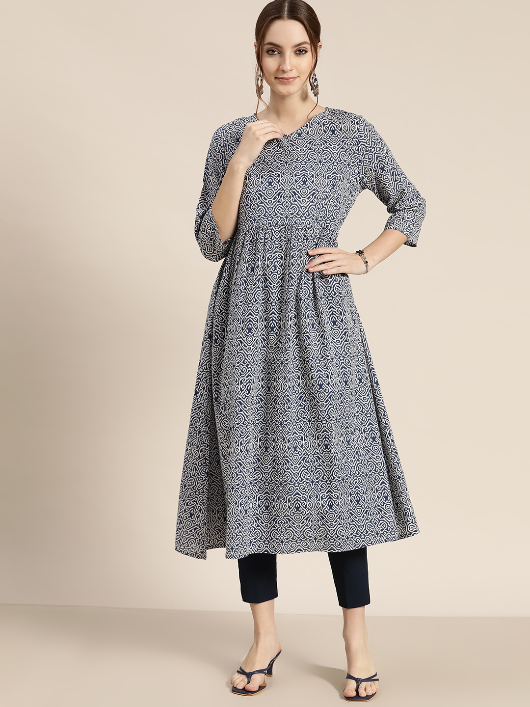 

Moda Rapido Women Navy Blue & White Ethnic Motifs Printed A-Line Kurta