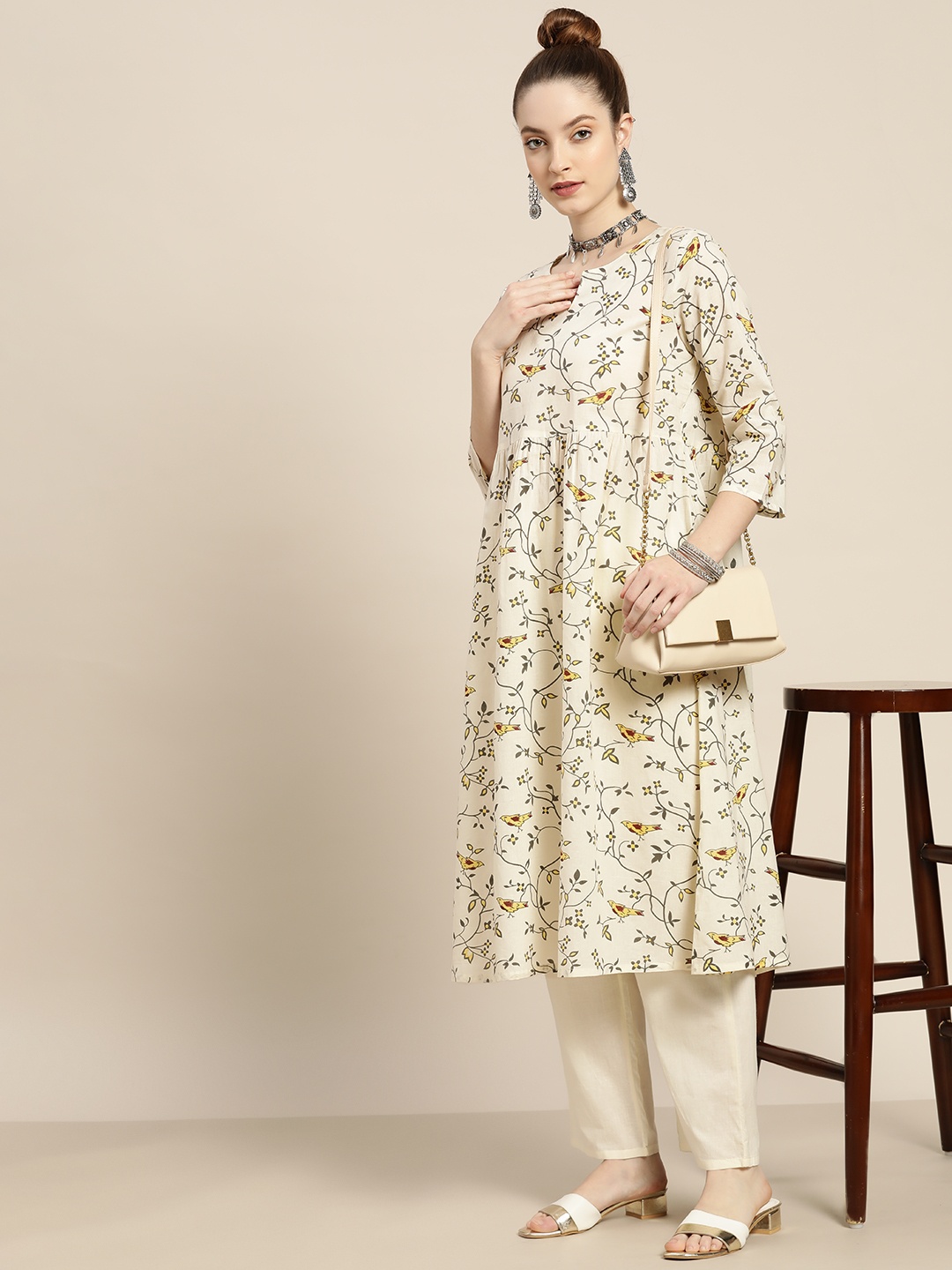 

Moda Rapido Women Cream-Coloured & Charcoal Grey Ethnic Printed Cotton Kurta with Trousers