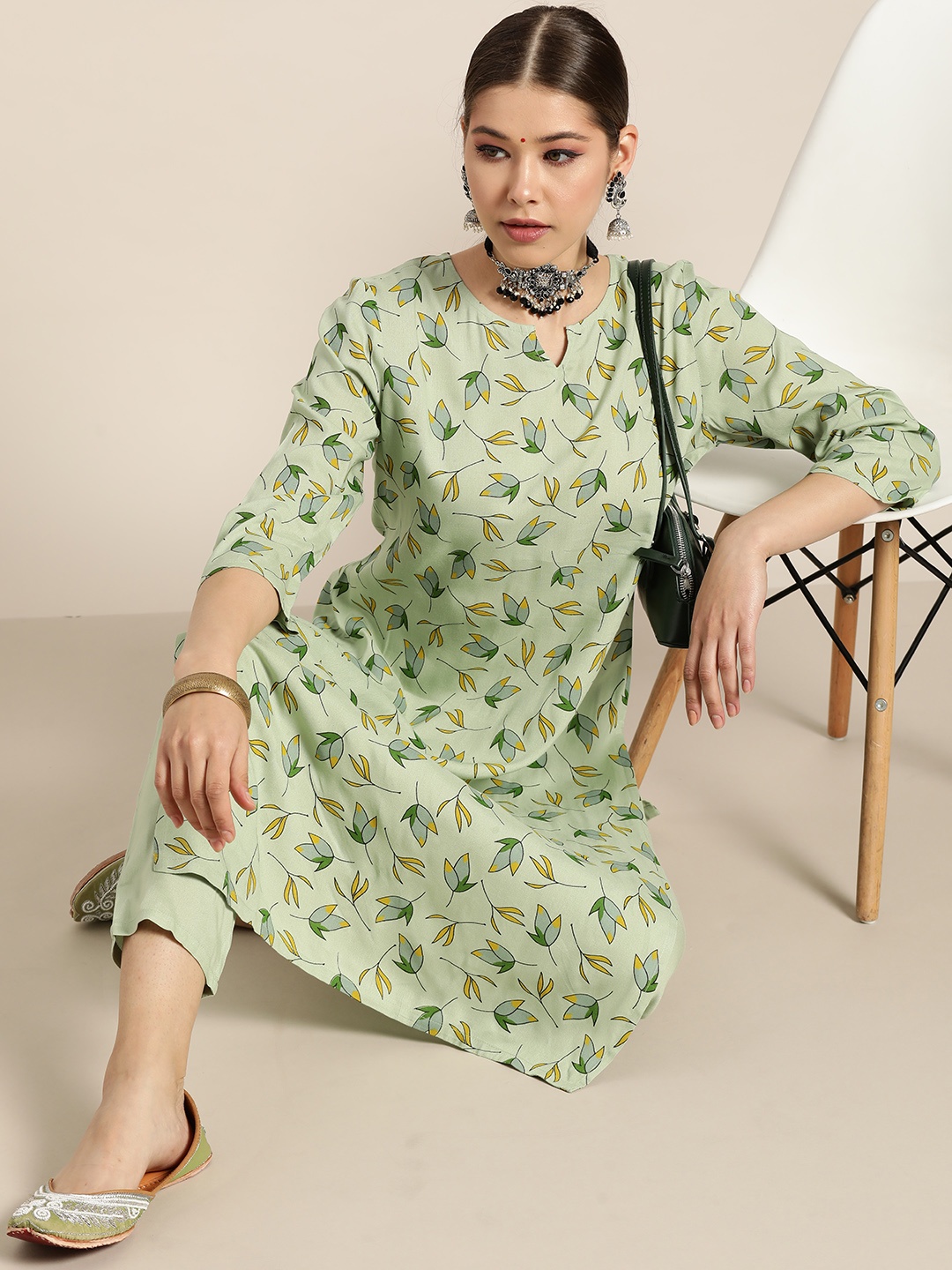 

Moda Rapido Women Green Floral Printed Kurta with Trousers