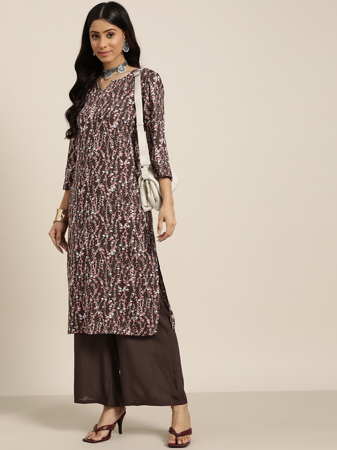 

Moda Rapido Women Brown Floral Printed Kurta with Palazzos
