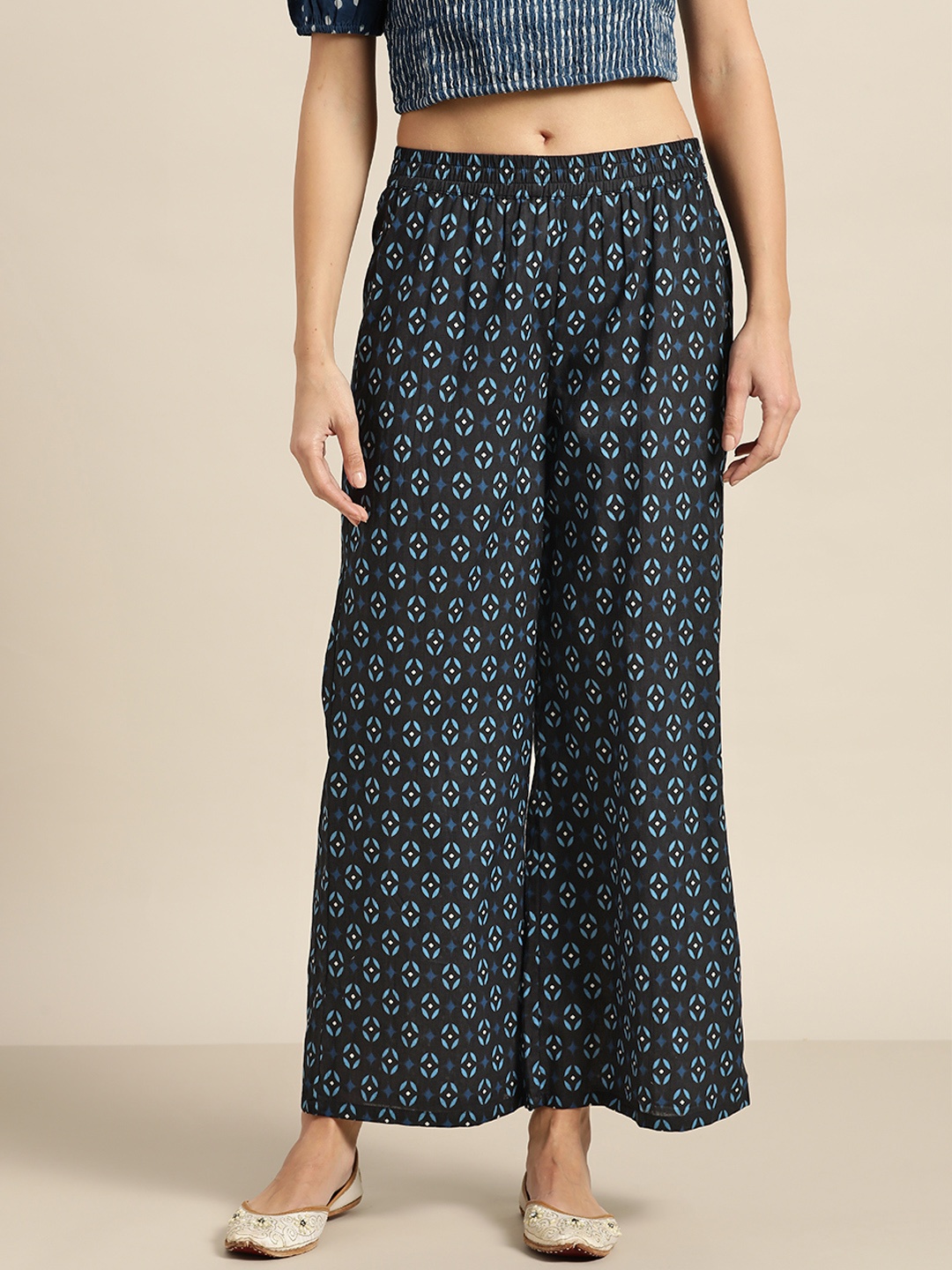 

Moda Rapido Women Black & Blue Ethnic Motifs Printed Palazzos