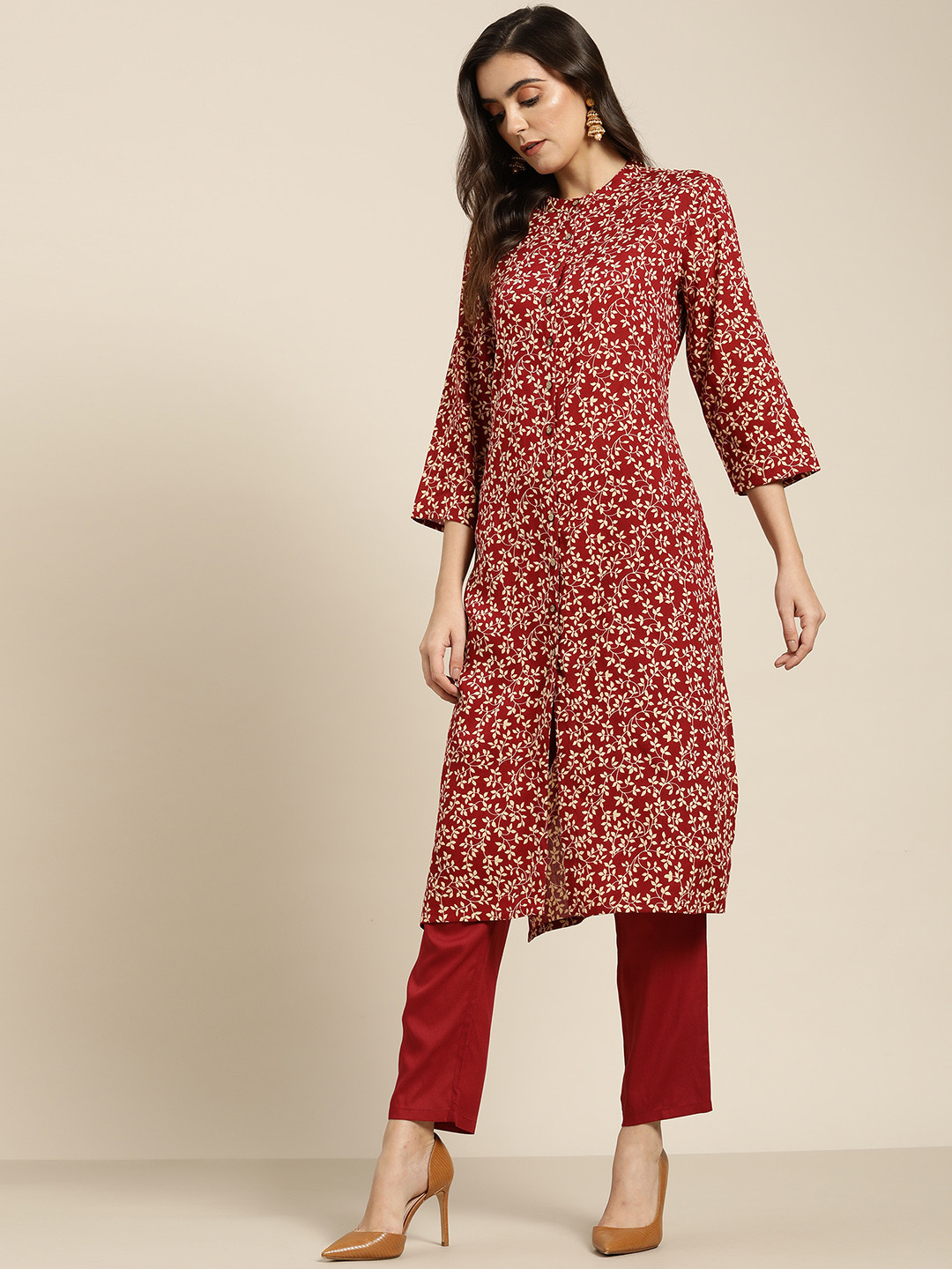 

Moda Rapido Women Maroon Ethnic Motif Printed Kurta with Palazzos