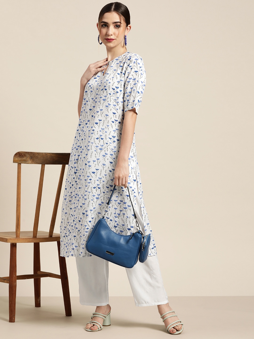 

Moda Rapido Women White & Blue Floral Printed Straight Kurta with Palazzos