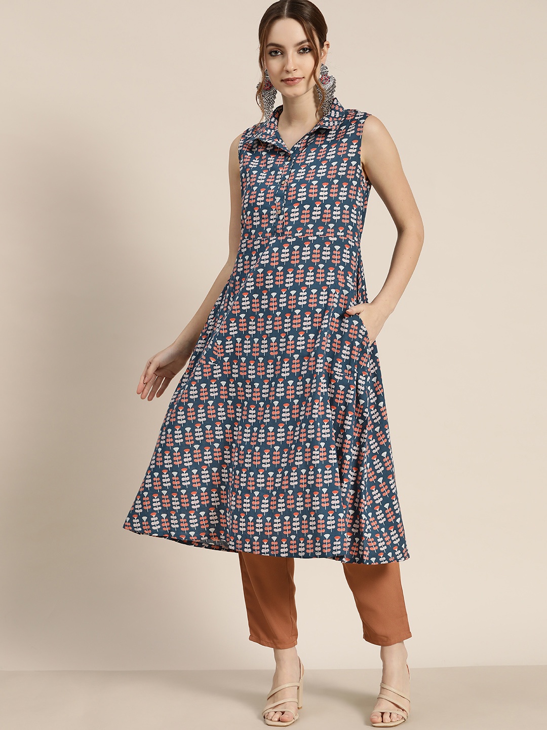 

Moda Rapido Women Navy Blue & Orange Cotton Ethnic Motif Printed A-Line Kurta