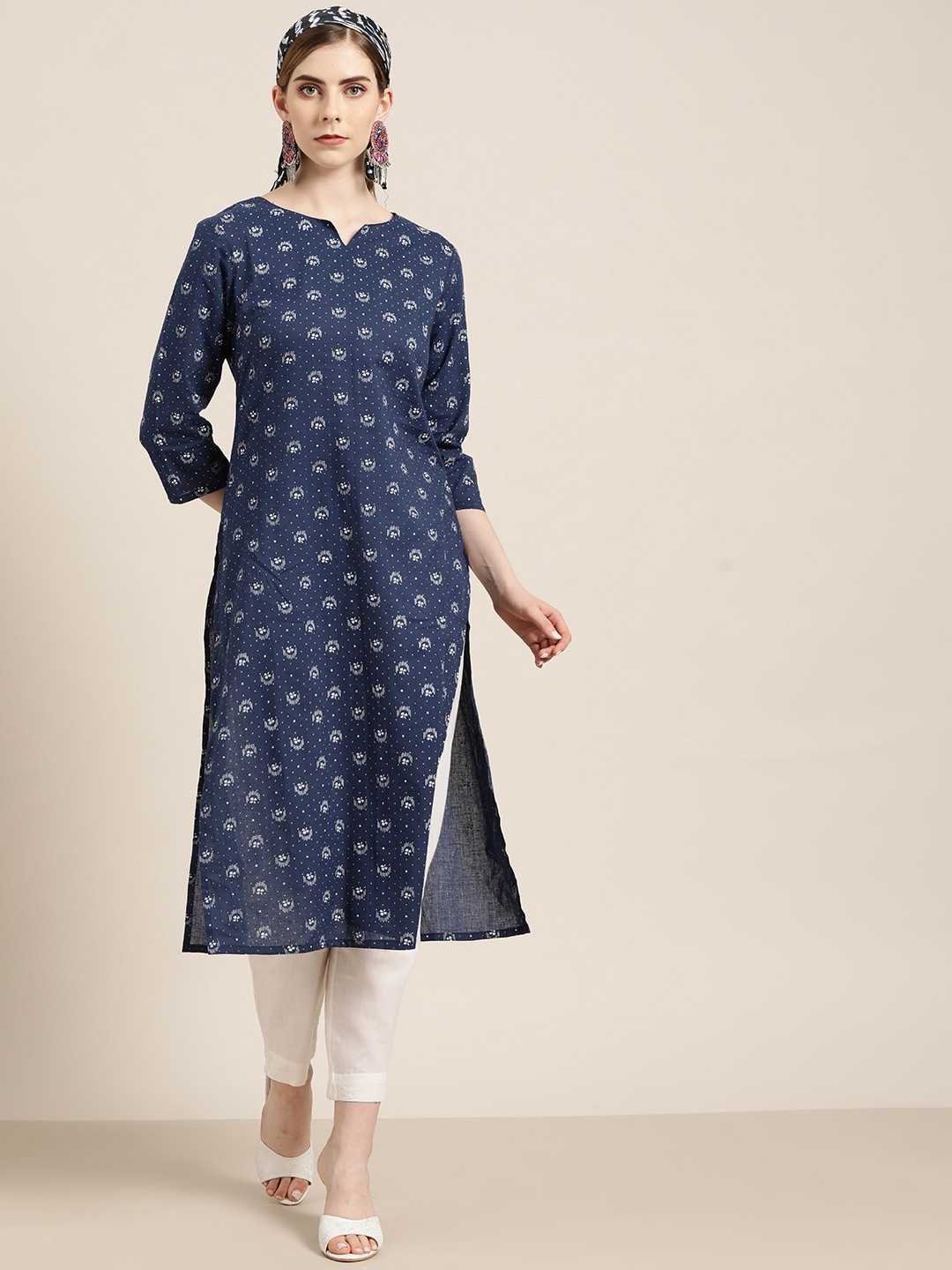 

Moda Rapido Women Navy Blue & White Ethnic Motifs Print Cotton Straight Kurta