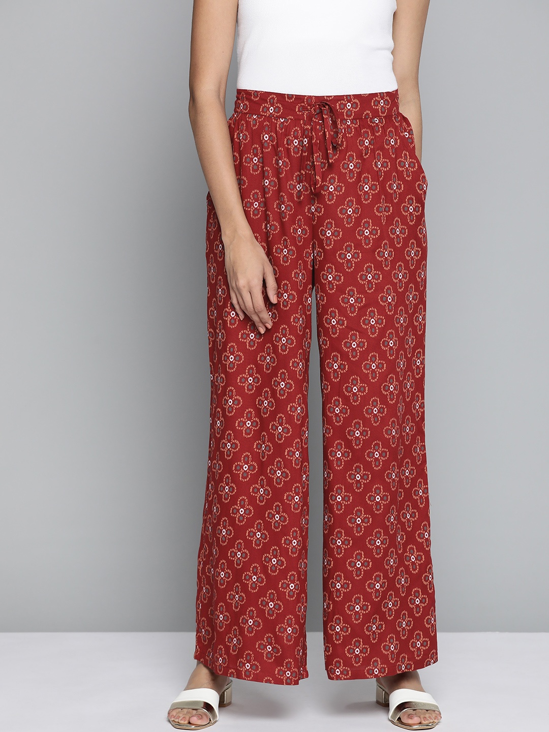 

HERE&NOW Women Maroon & Orange Ethnic Motifs Printed Ethnic Palazzos