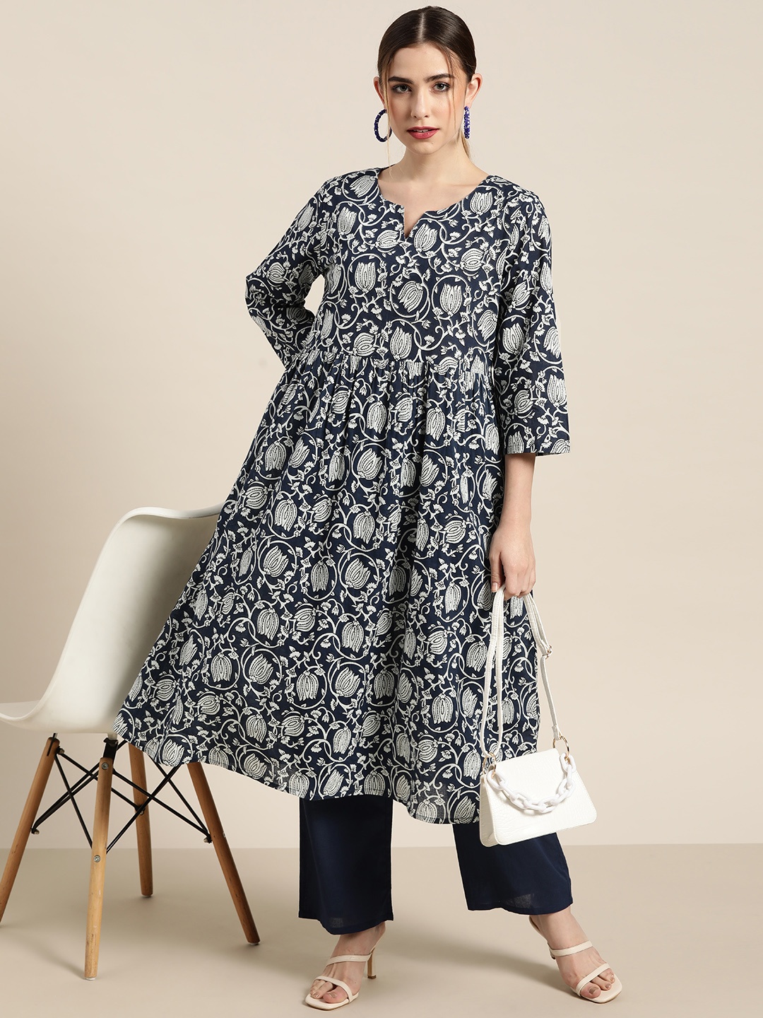 

Moda Rapido Women Navy Blue & White Ethnic Motifs Printed Pure Cotton Kurta with Palazzos