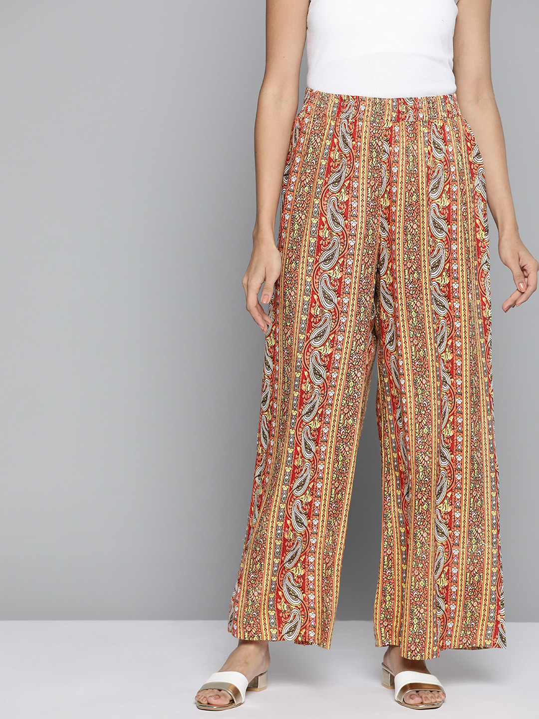 

HERE&NOW Women Yellow & Red Ethnic Motifs Printed Ethnic Palazzos