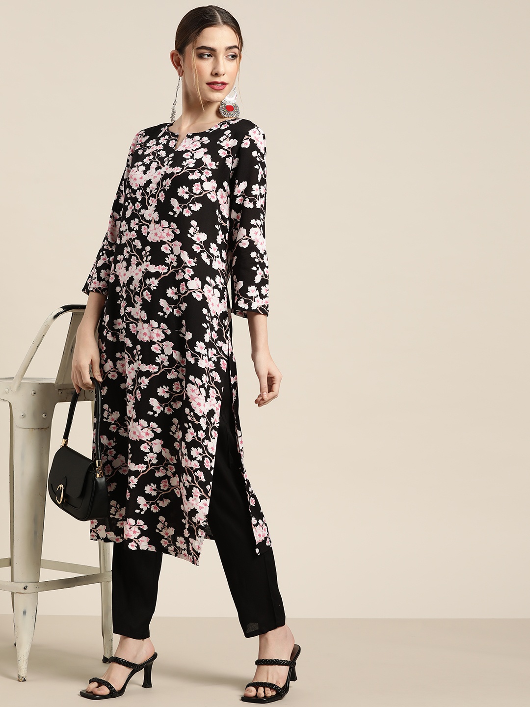 

Moda Rapido Women Black Floral Printed Kurta with Trousers