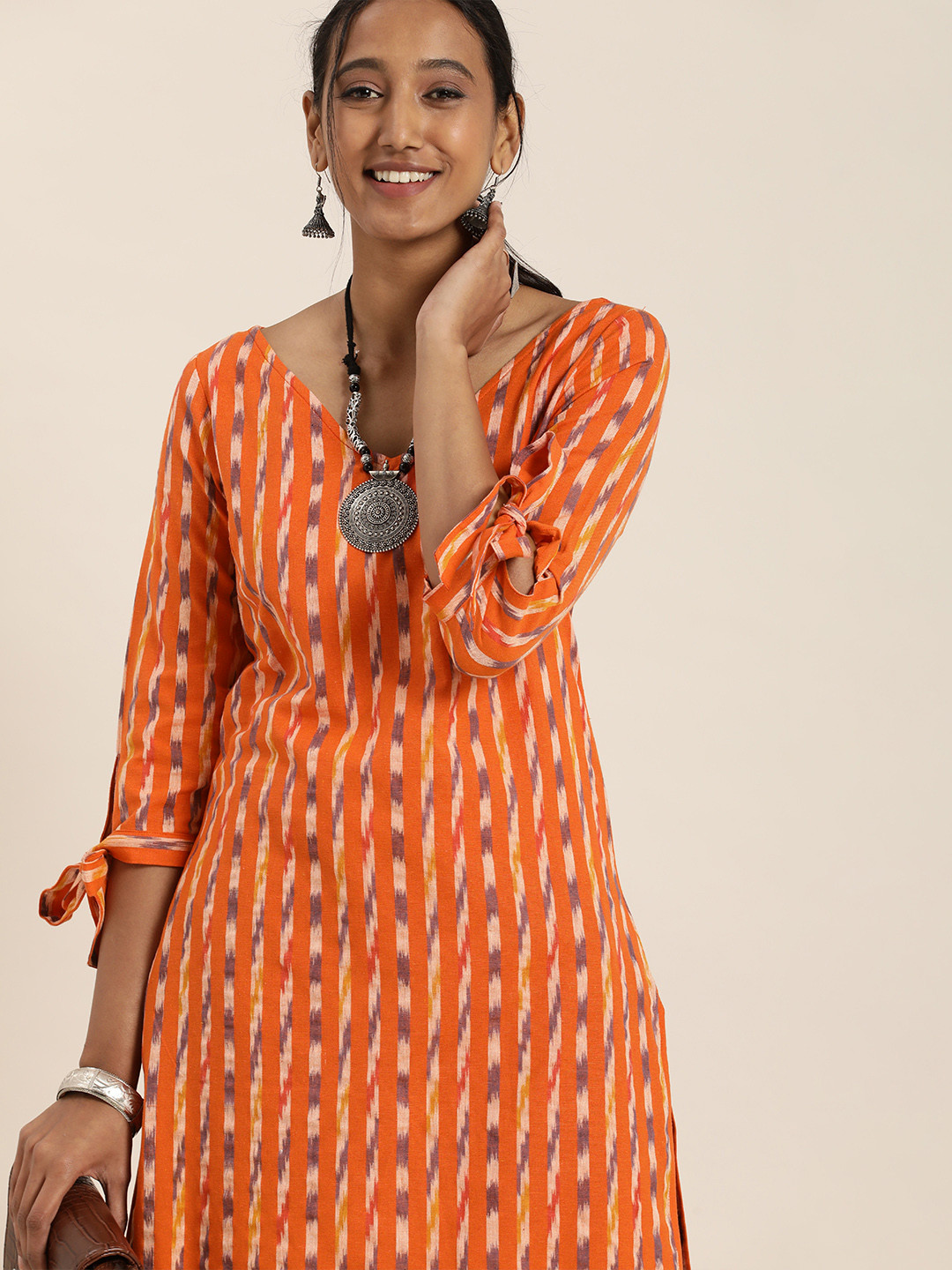 

Taavi Women Orange Ikat Woven Design Pure Cotton Kurta
