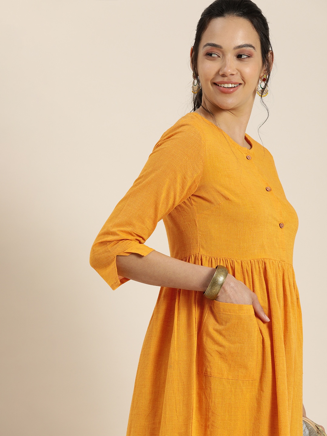 

Taavi Women Mustard Yellow Woven Legacy Pure Cotton Sustainable Kurta with Pocket