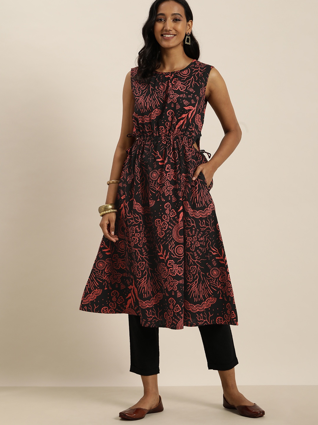 

Taavi Women Black & Orange Bagru Fossil Print Pure Cotton Anarkali Kurta