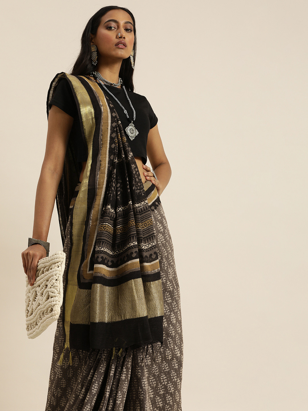 

Taavi Brown & Black Handblock Ethnic Motifs Printed Saree