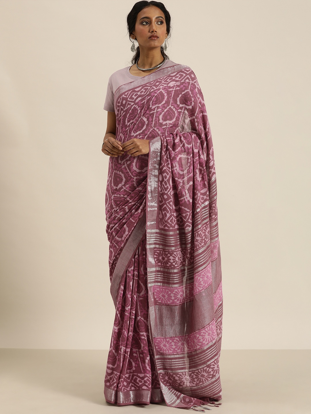 

Taavi Pink & White Dabu Ethnic Printed Saree