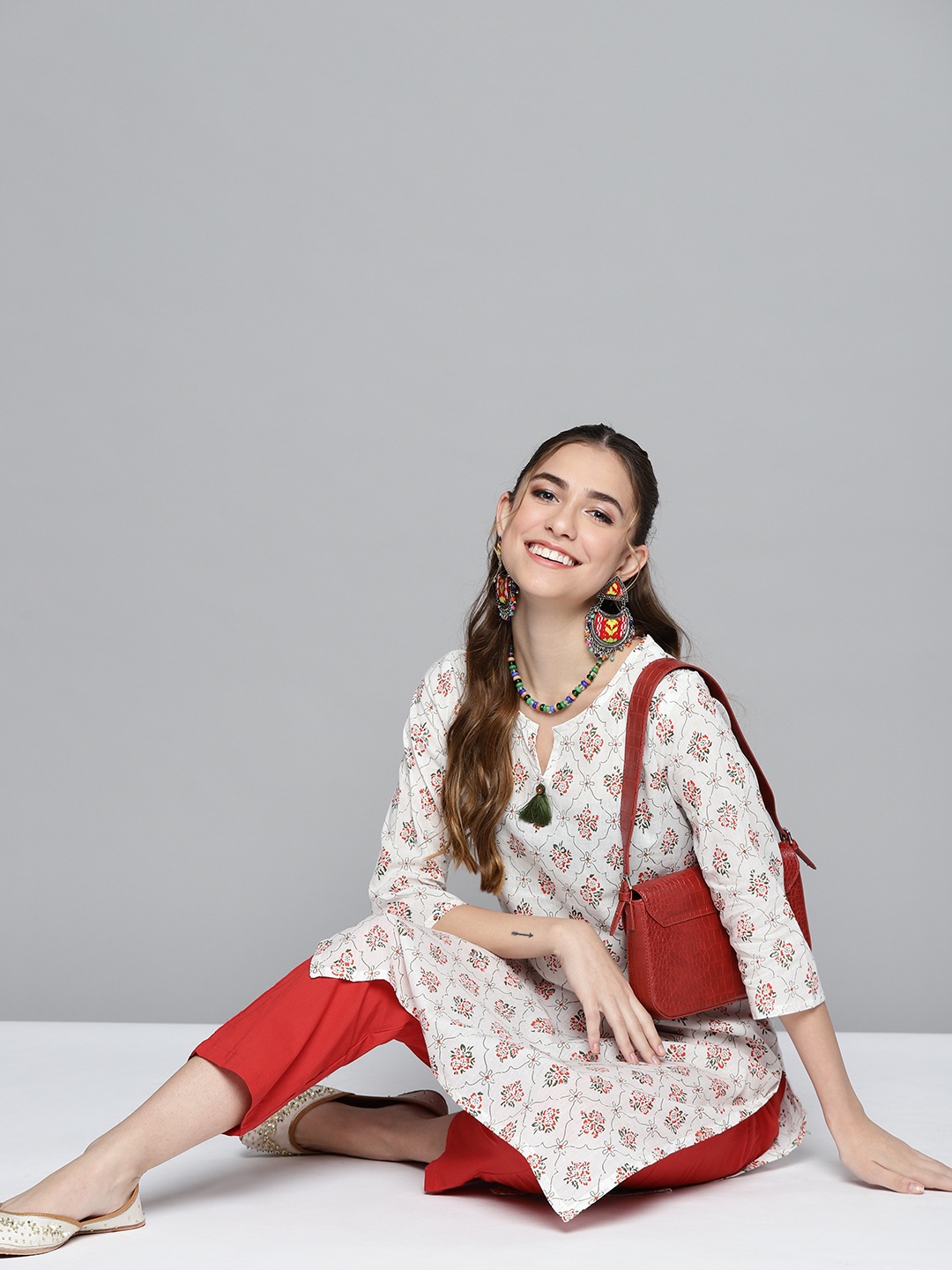 

HERE&NOW Women White & Orange Ethnic Motifs Printed Straight Kurta