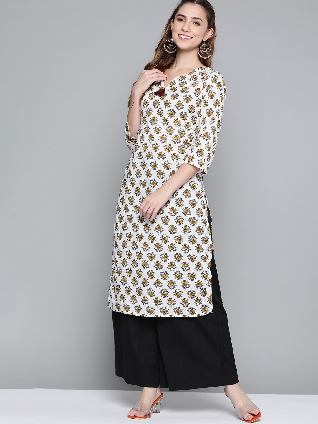 

HERE&NOW Women White & Mustard Yellow Cotton Floral Print Kurta with Tassels