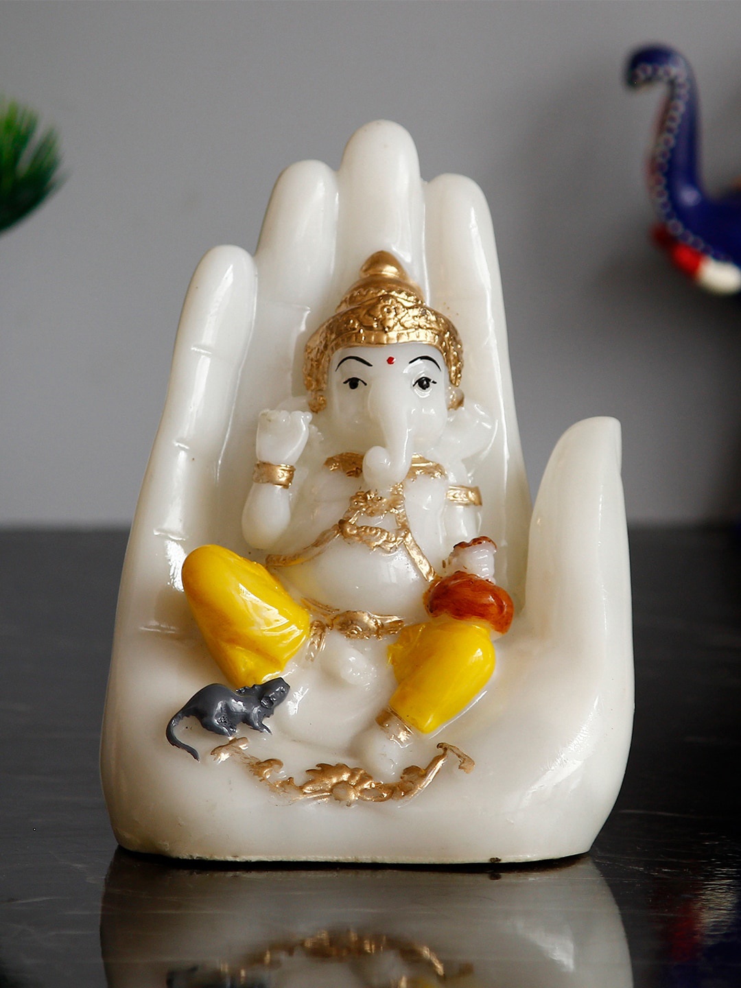 

eCraftIndia White & Yellow Palm Ganesha Figurine Showpiece