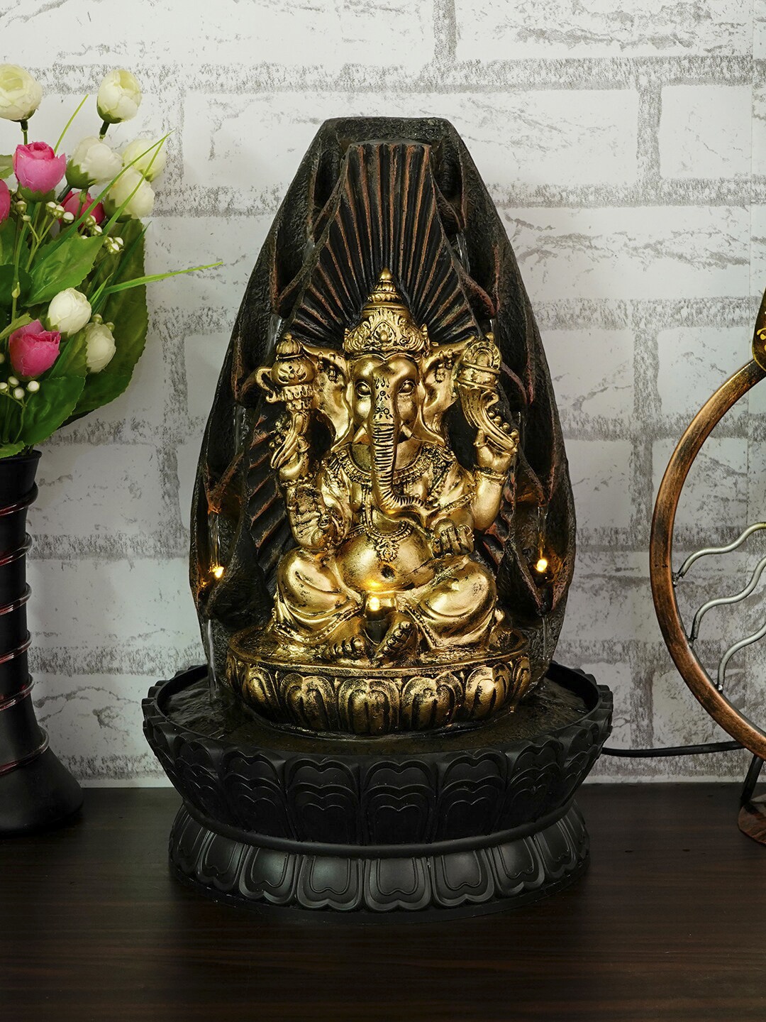 

eCraftIndia Black & Gold-Toned Lord Ganesha Decorative Water Fountain