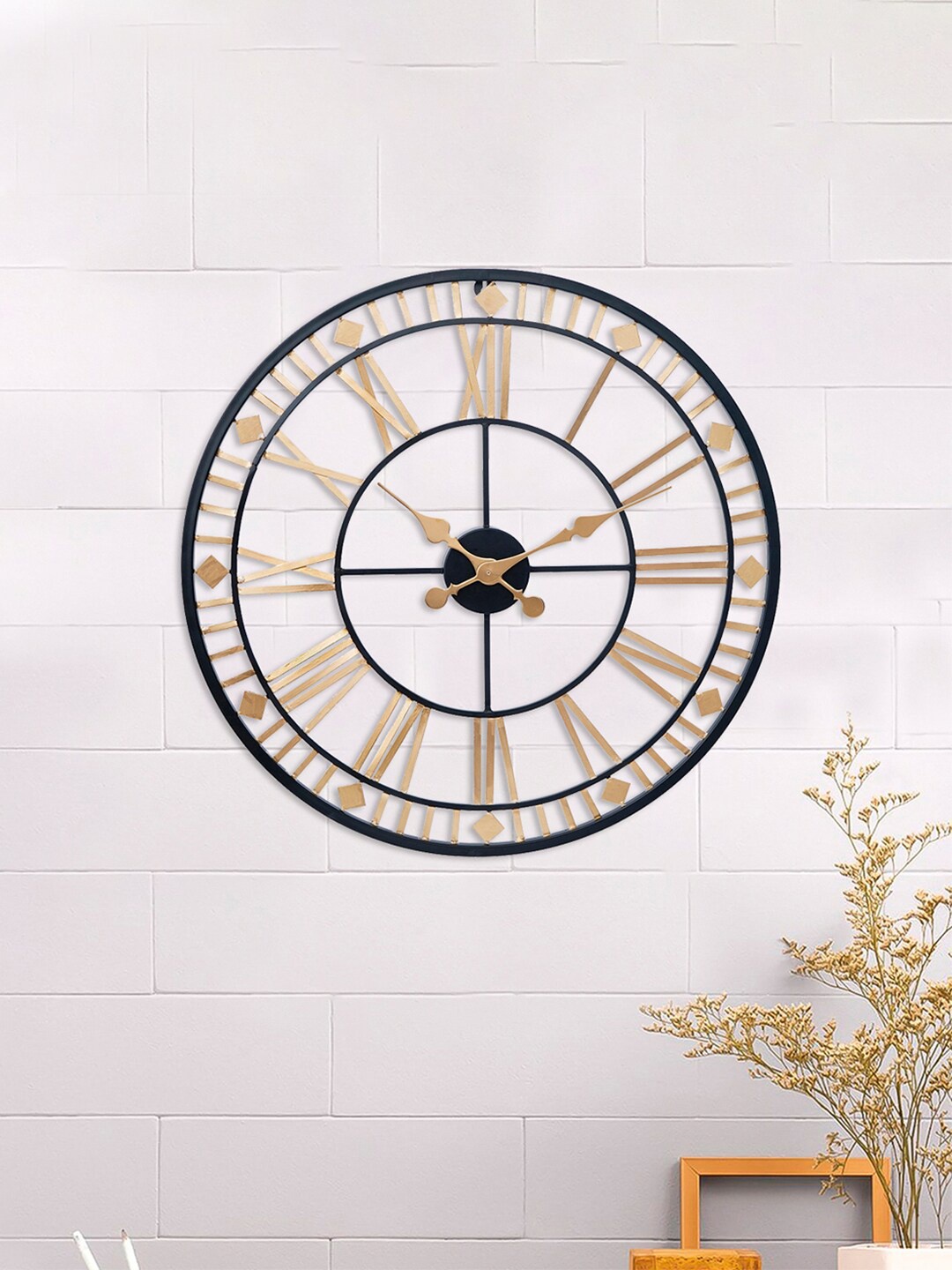

eCraftIndia Gold-Toned & Black Textured Traditional Wall Clock