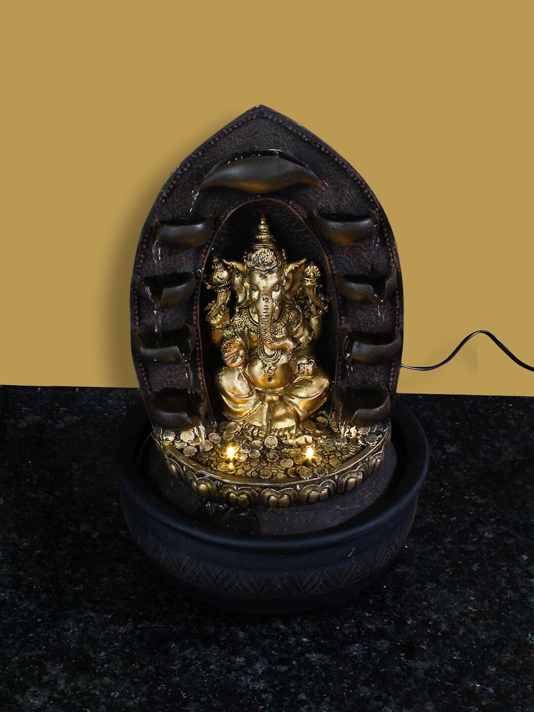 

eCraftIndia Gold-Toned & Black Lord Ganesha Polystone Water Fountain
