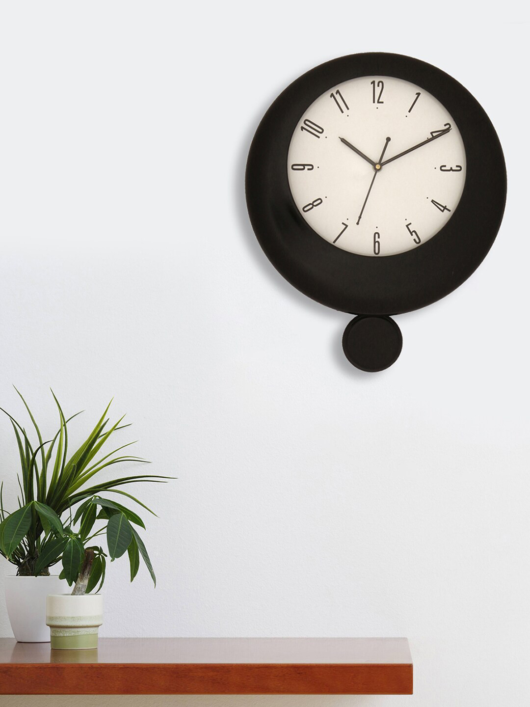 

eCraftIndia Black & White Traditional Pendulum Wall Clock
