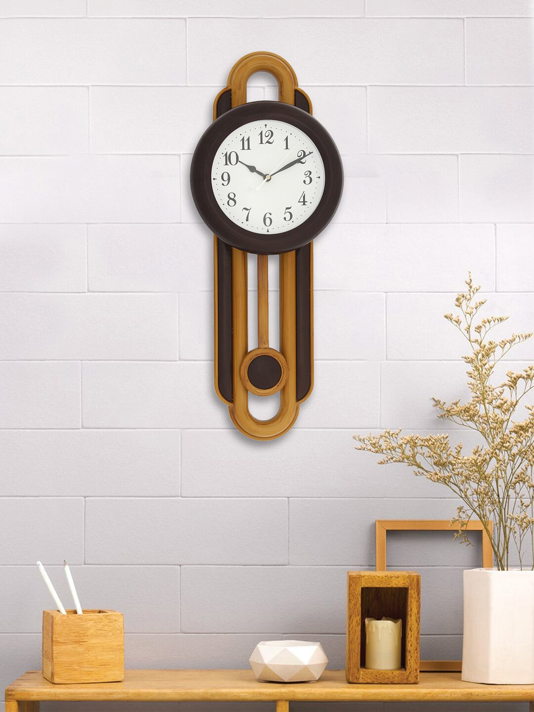 

eCraftIndia Yellow & Brown Abstract Shaped Pendulum Traditional Wall Clock