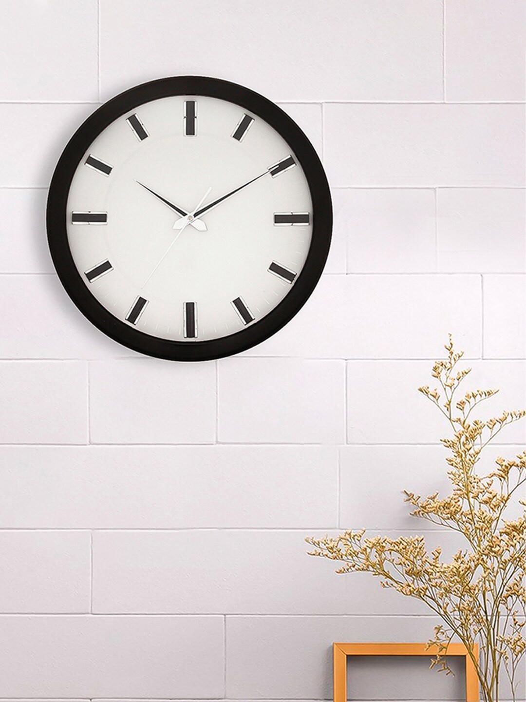 

eCraftIndia Black & White Round Contemporary Wooden Wall Clock