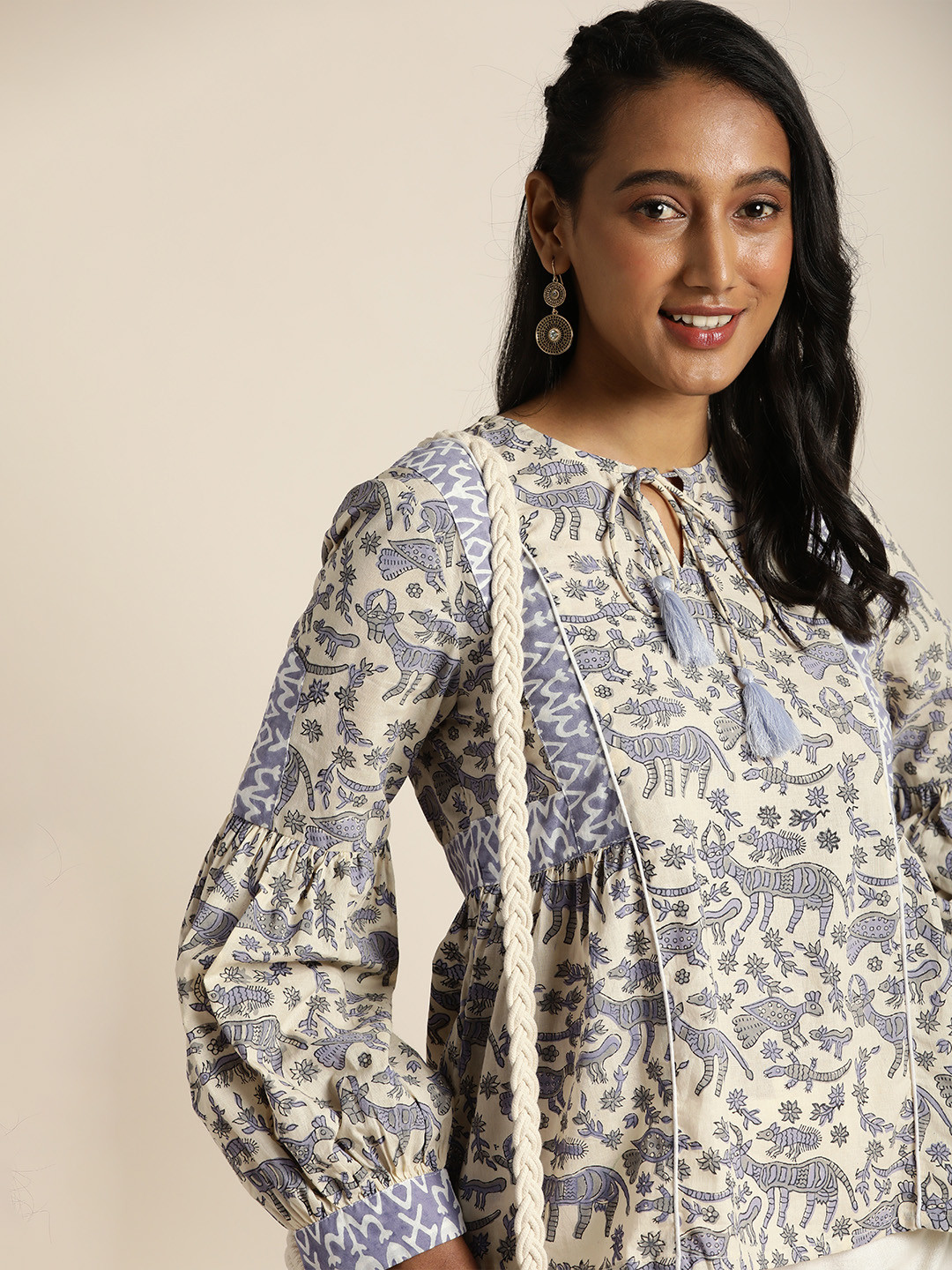 

Taavi Cream-Coloured & Purple Bagru Print Tie-Up Neck Bishop Sleeves Top