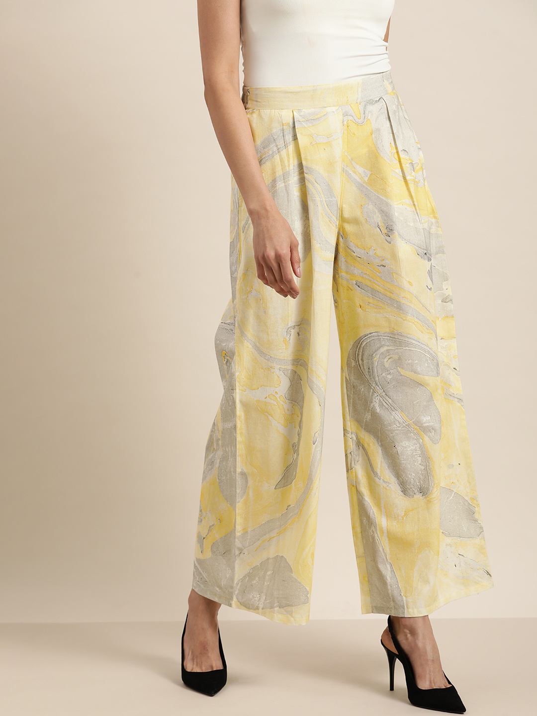 

Taavi Women White Marbling Printed Flared Wrinkle Free Palazzo Trousers