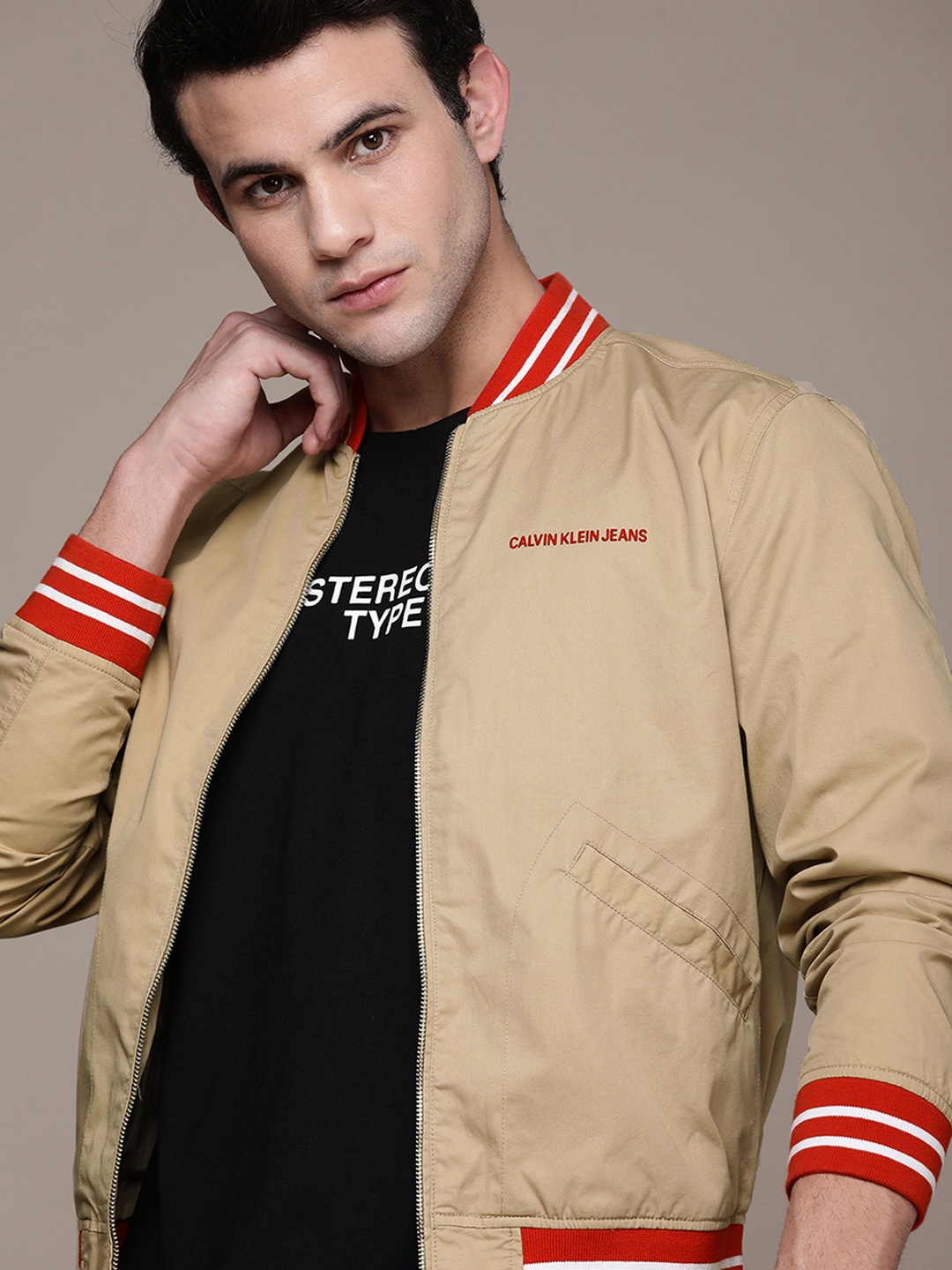 

Calvin Klein Jeans Men Brown Brand Logo Printed ACOOLMAX BOMBER Jacket