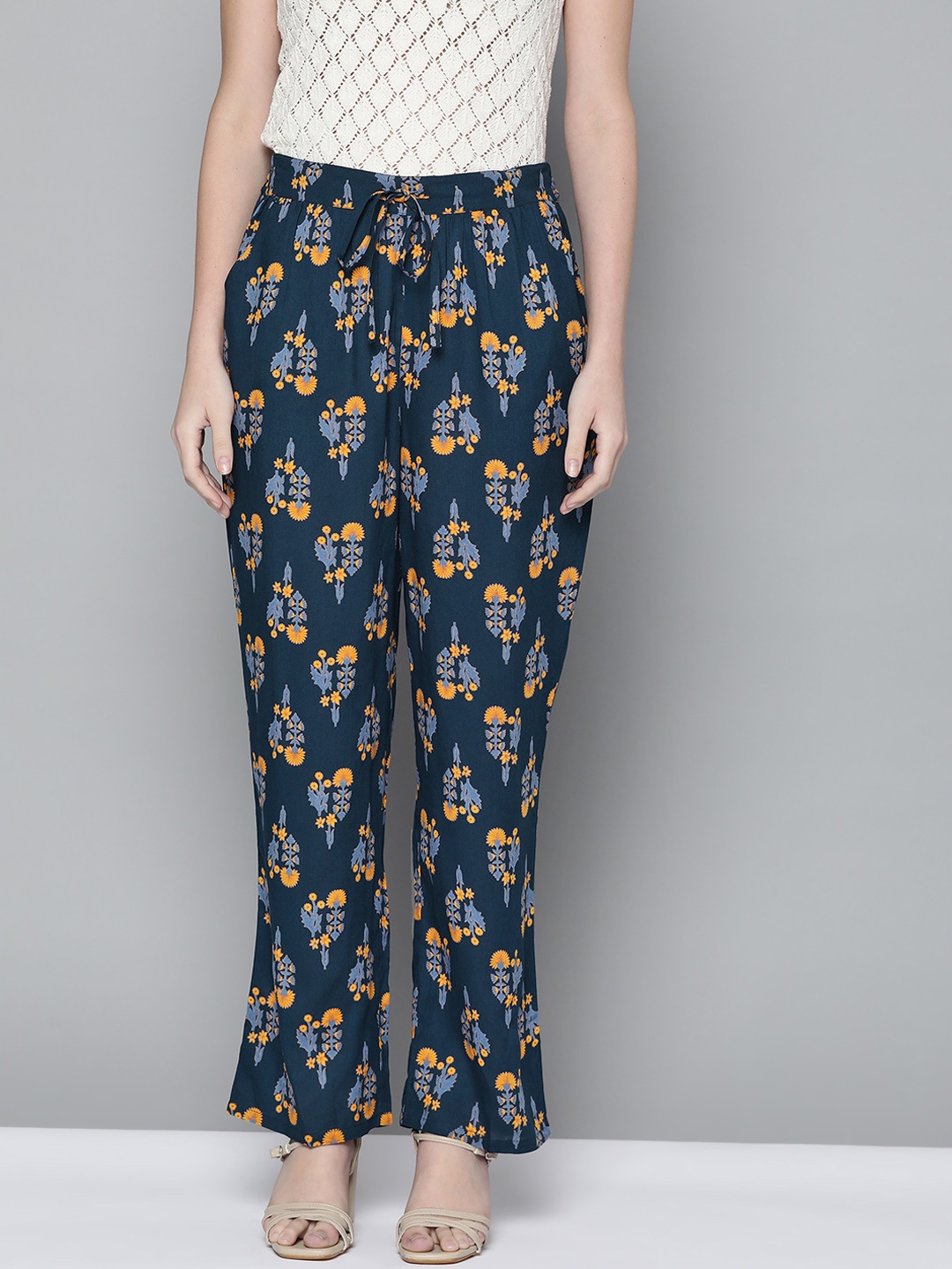 

HERE&NOW Women Navy Blue & Yellow Floral Printed Palazzos