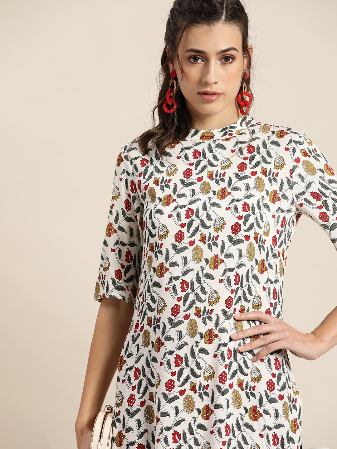 

Moda Rapido Women White & Green Ethnic Motifs Printed Kurta