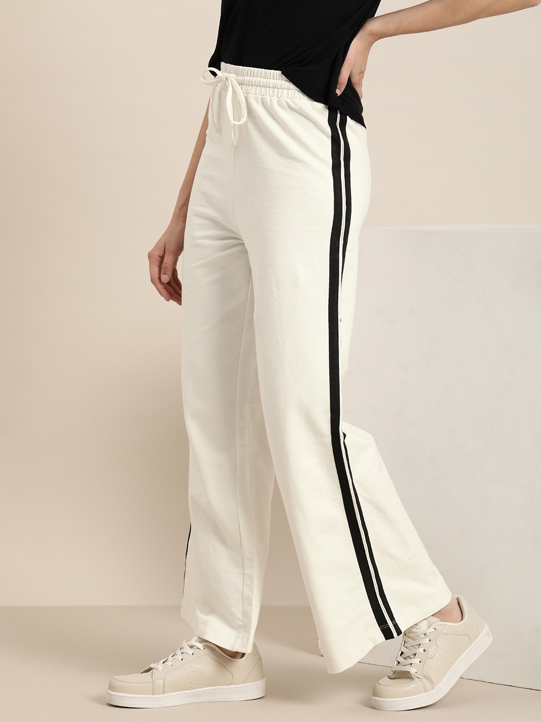 

her by invictus Women Solid Mid-Rise Track Pants With Side Stripes, White