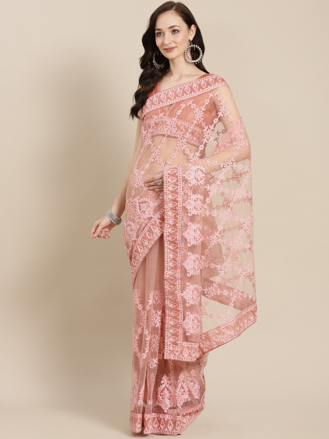 

Kalista Peach-Coloured Floral Net Saree