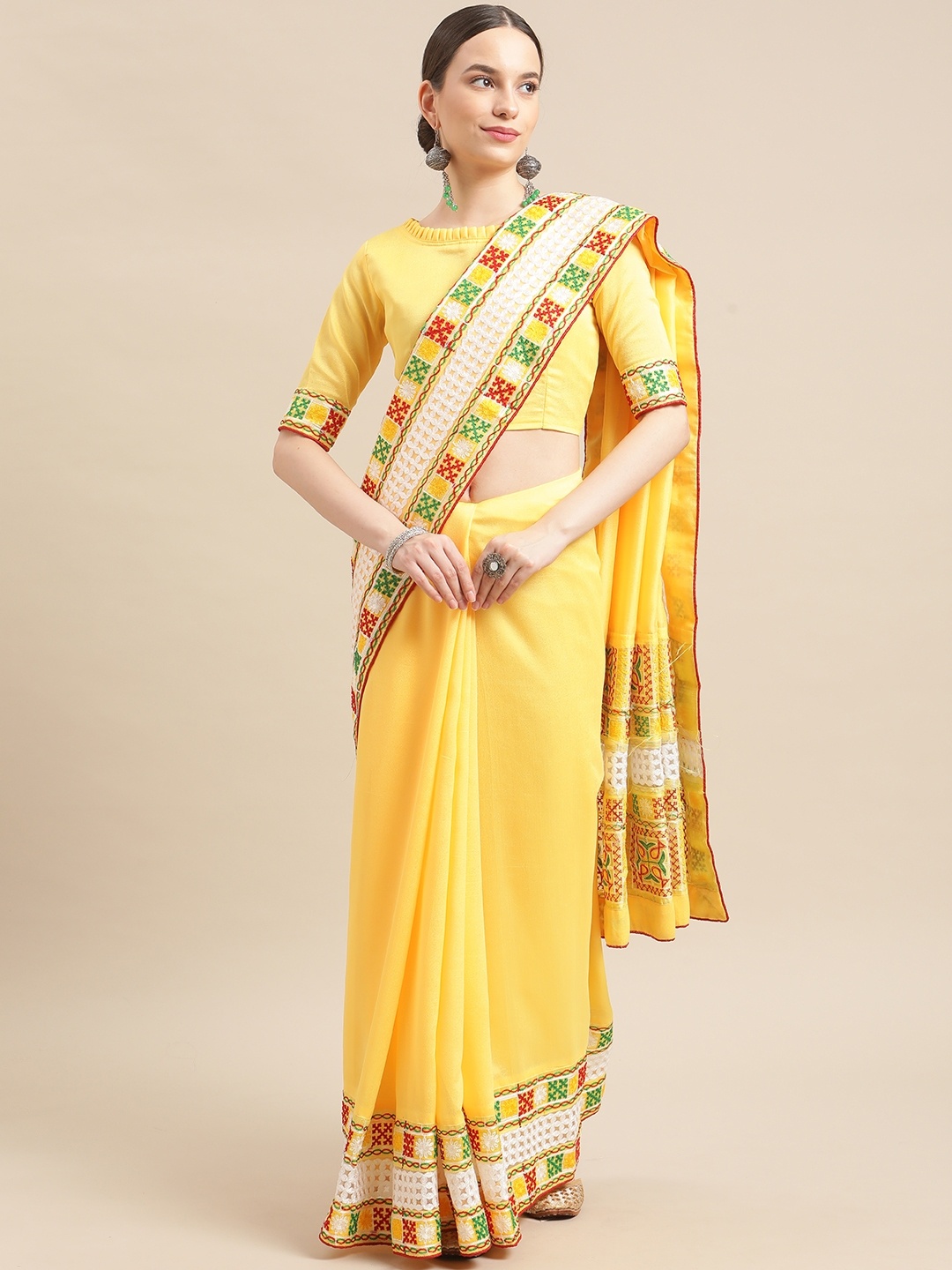 

RAJGRANTH Yellow Ethnic Motifs Embroidered Saree