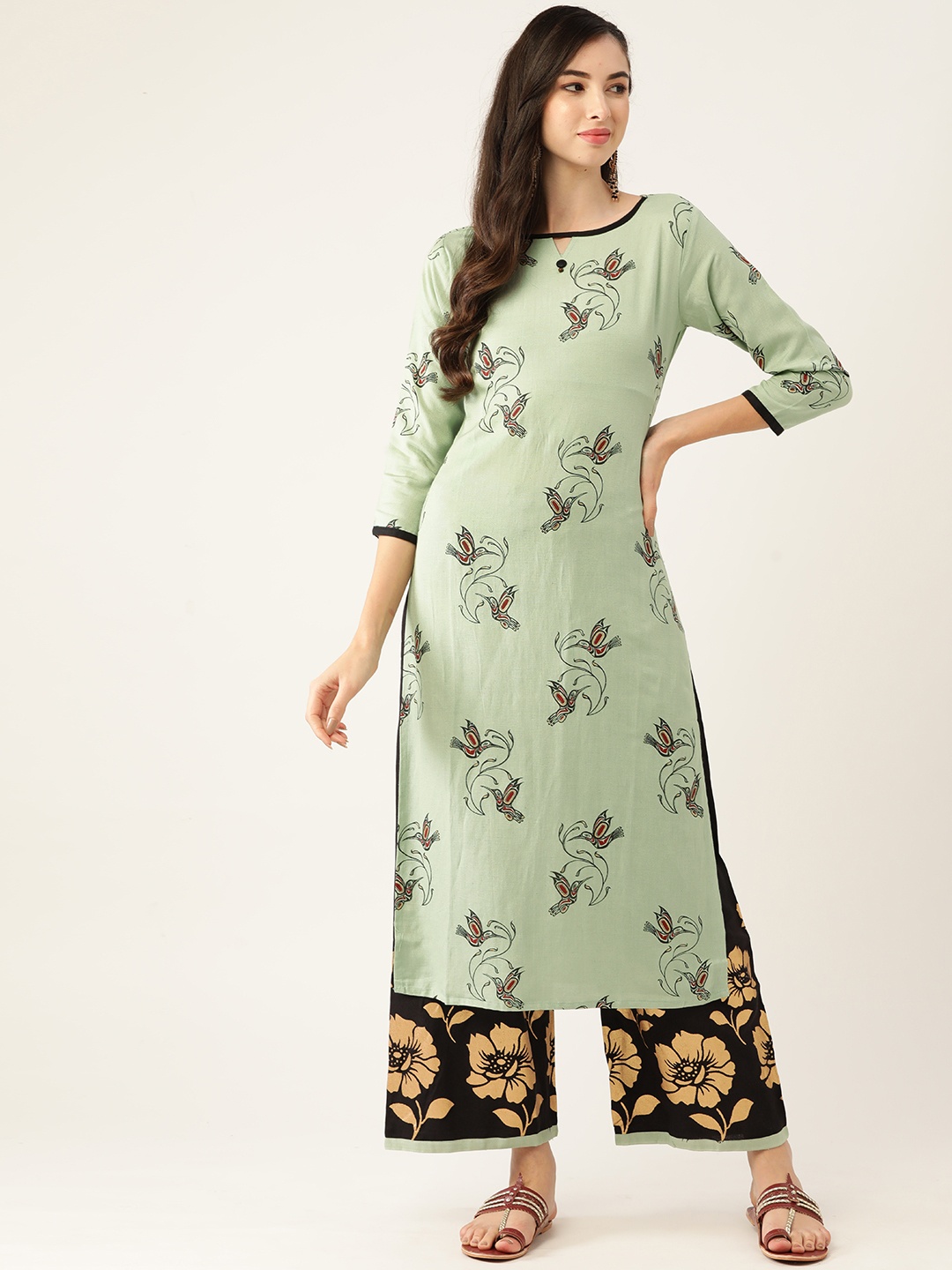

VAABA Women Sea Green Ethnic Motifs Printed Regular Kurta with Palazzos