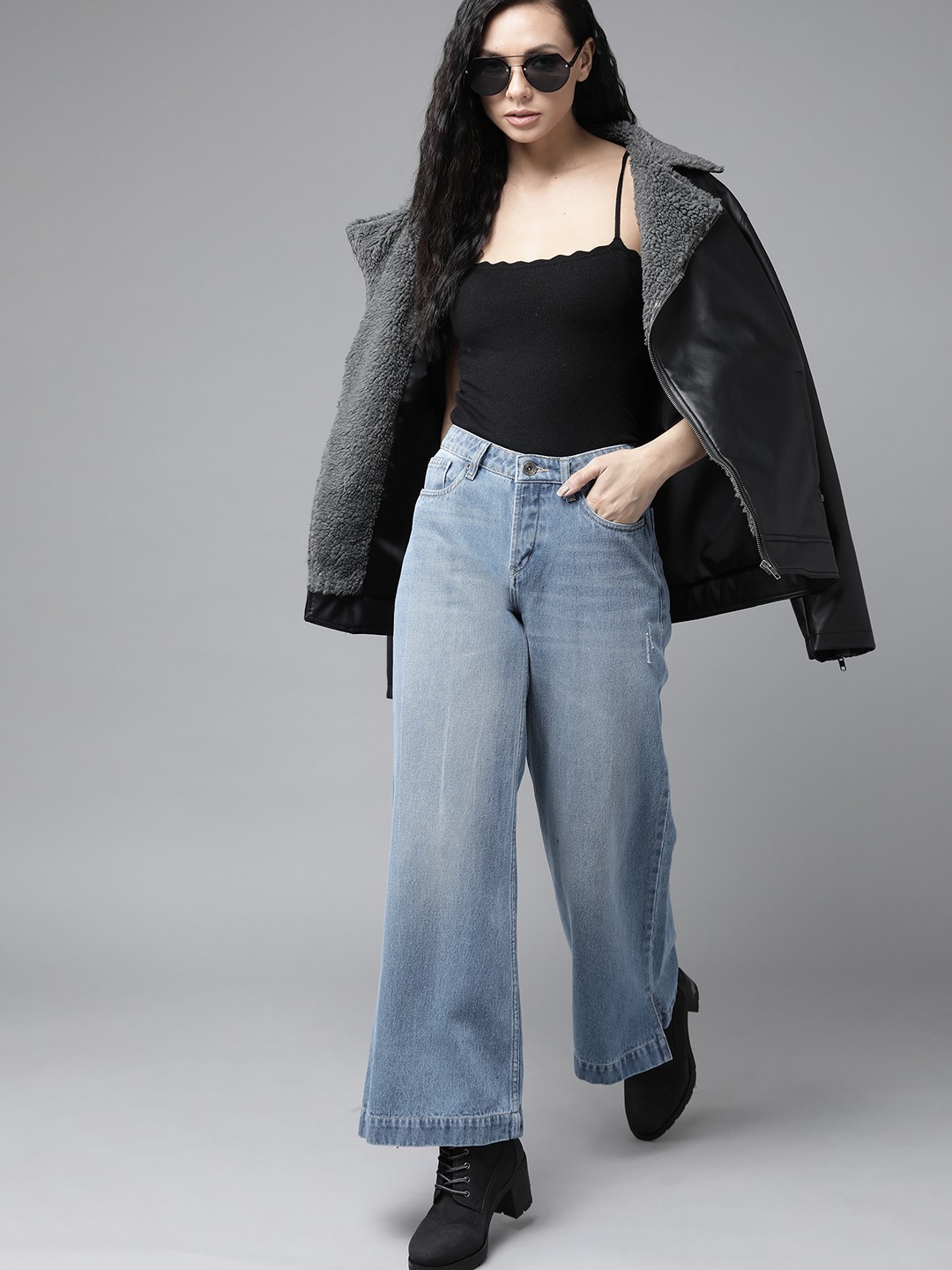 

The Roadster Lifestyle Co Women Blue Cotton Wide Leg Flared Low Distress Light Fade Jeans