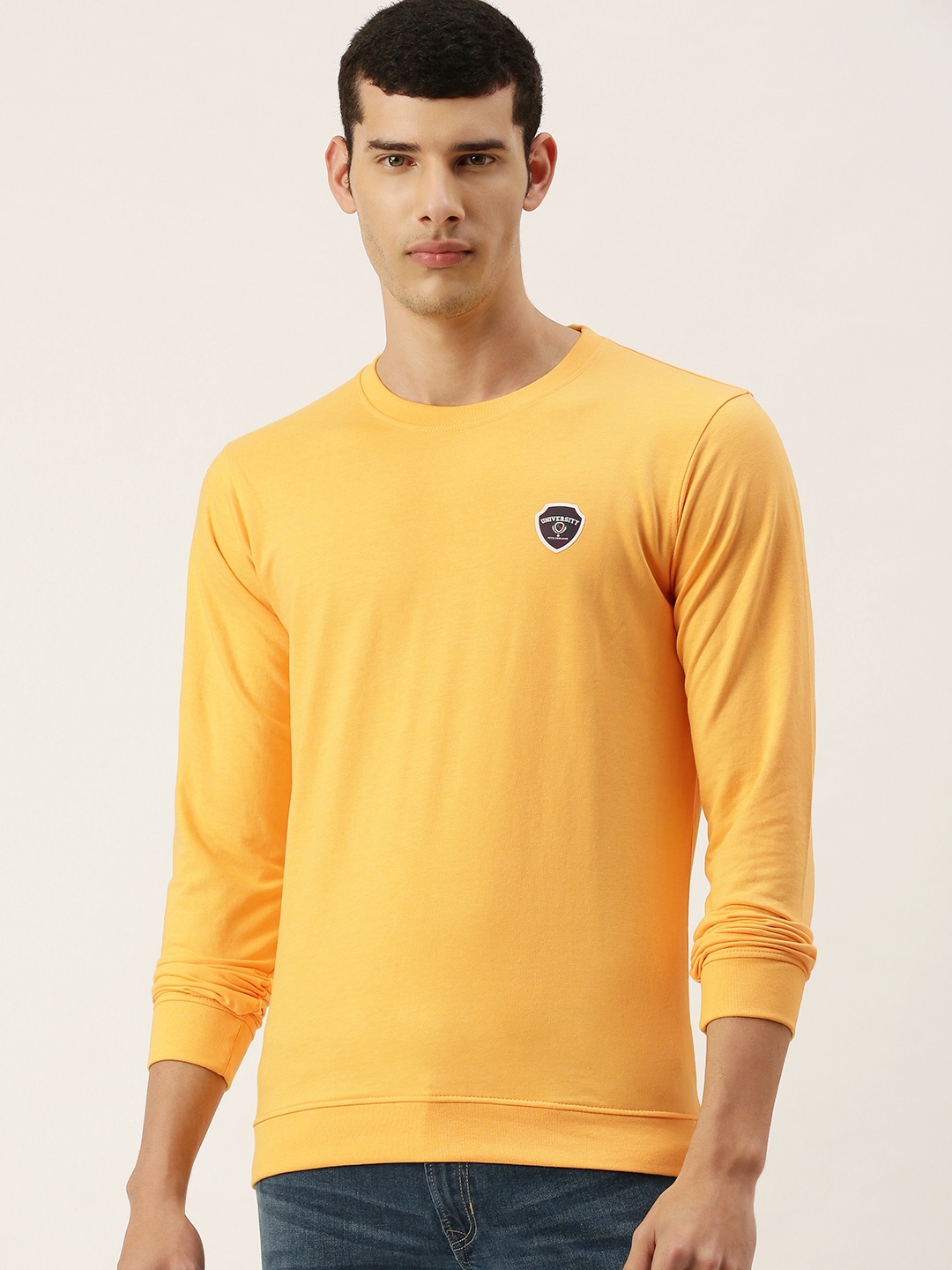 

PETER ENGLAND UNIVERSITY Men Yellow Solid Sweatshirt