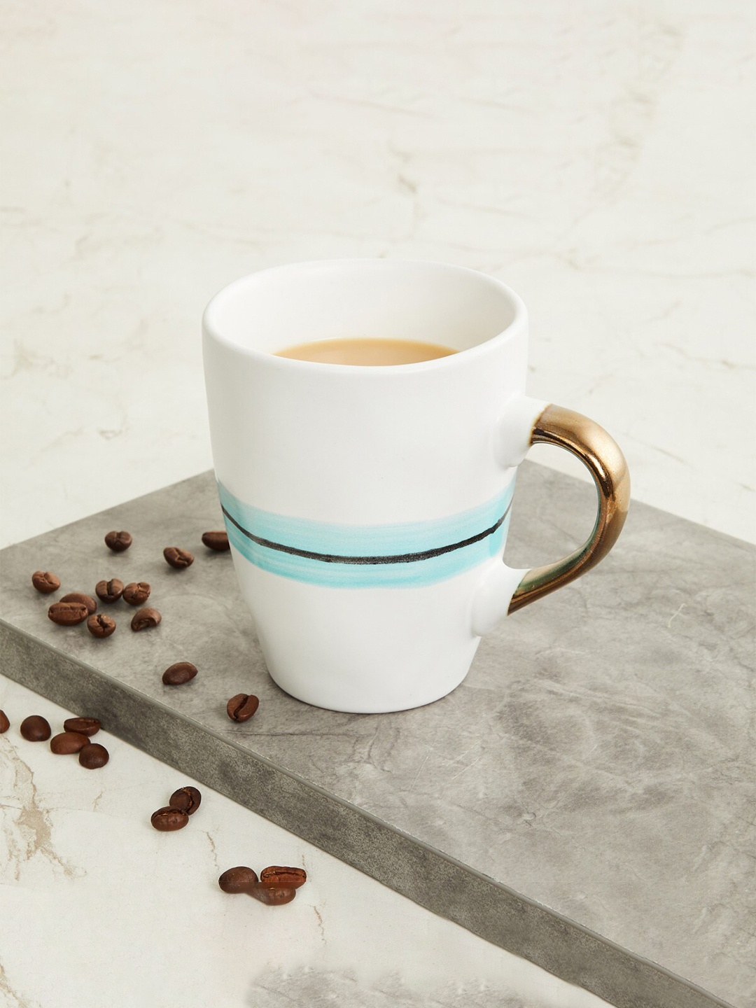 

Home Centre Blue & White Printed Stoneware Glossy Mug