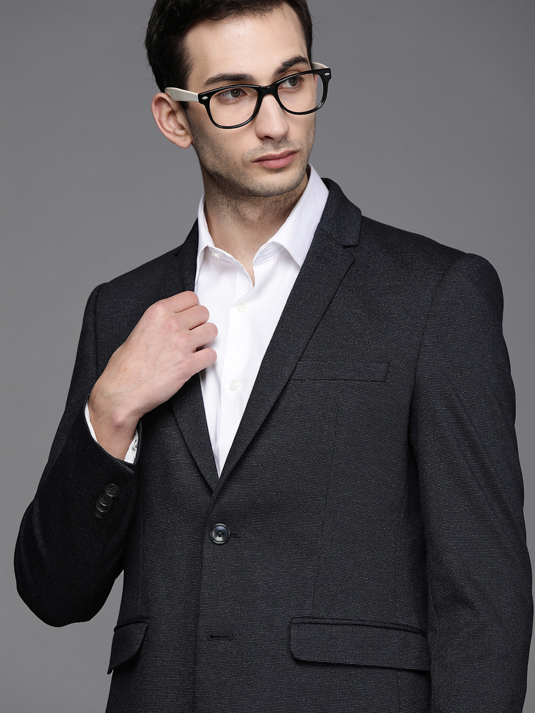 

Peter England Elite Men Charcoal Grey Self-Design Slim Fit Single-Breasted Formal Blazer