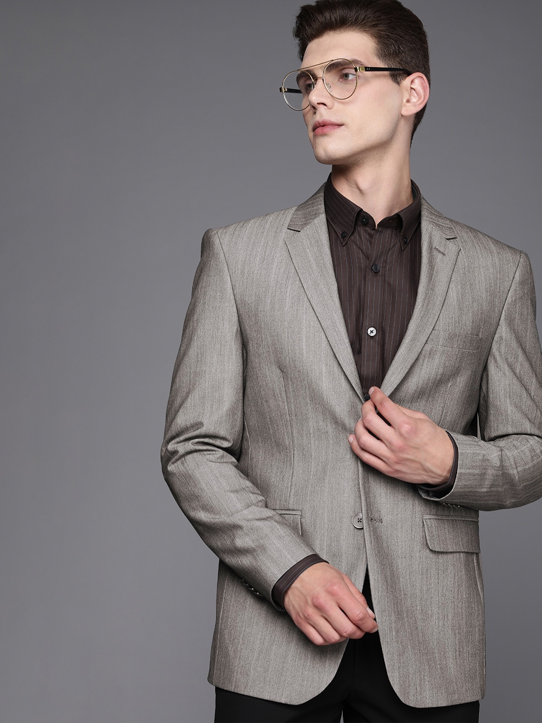 

Peter England Elite Men Light Grey Self Design Formal Blazer