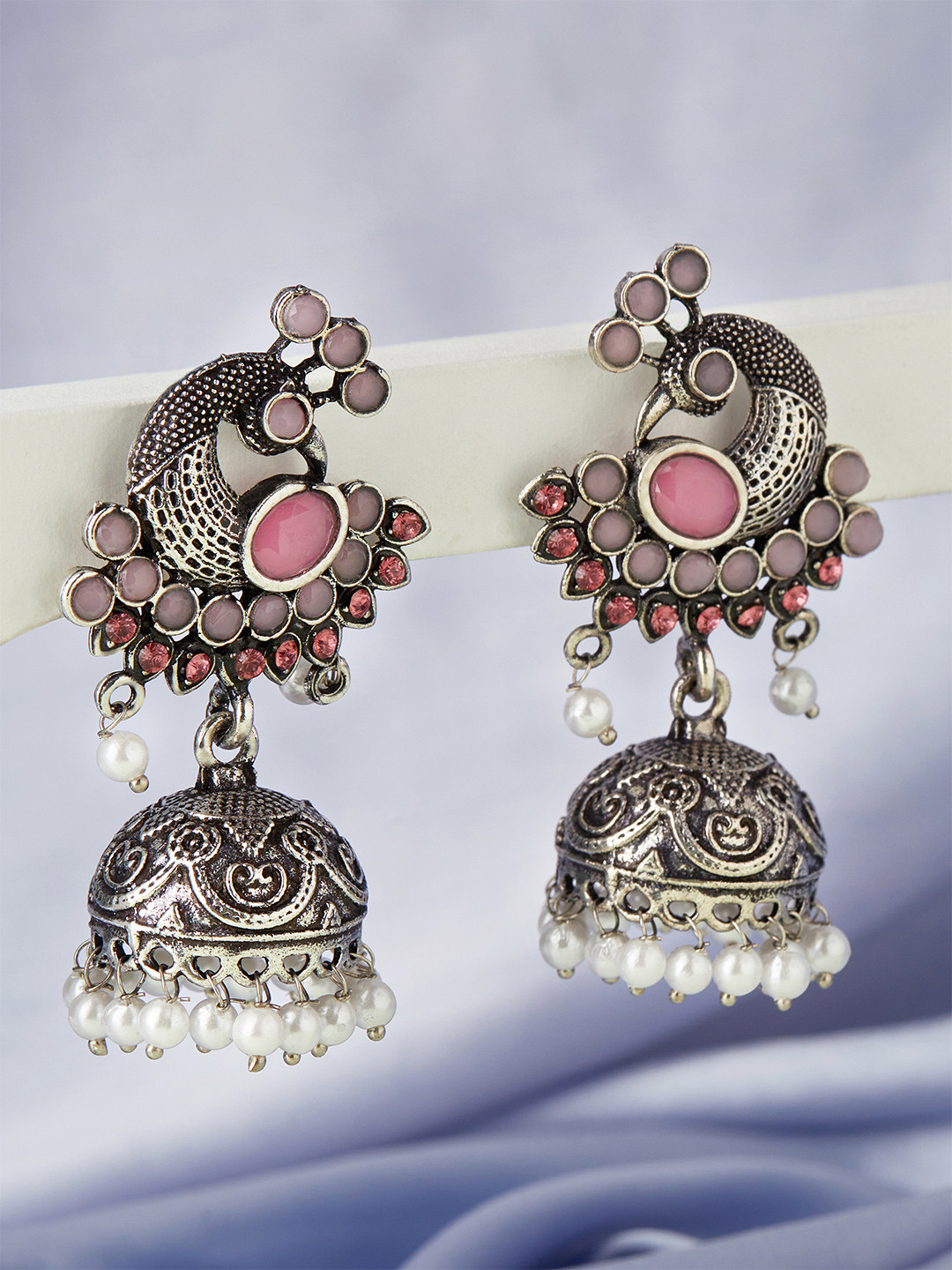

Anouk Silver-Toned & Pink Silver-Plated Peacock Jhumkas Earrings