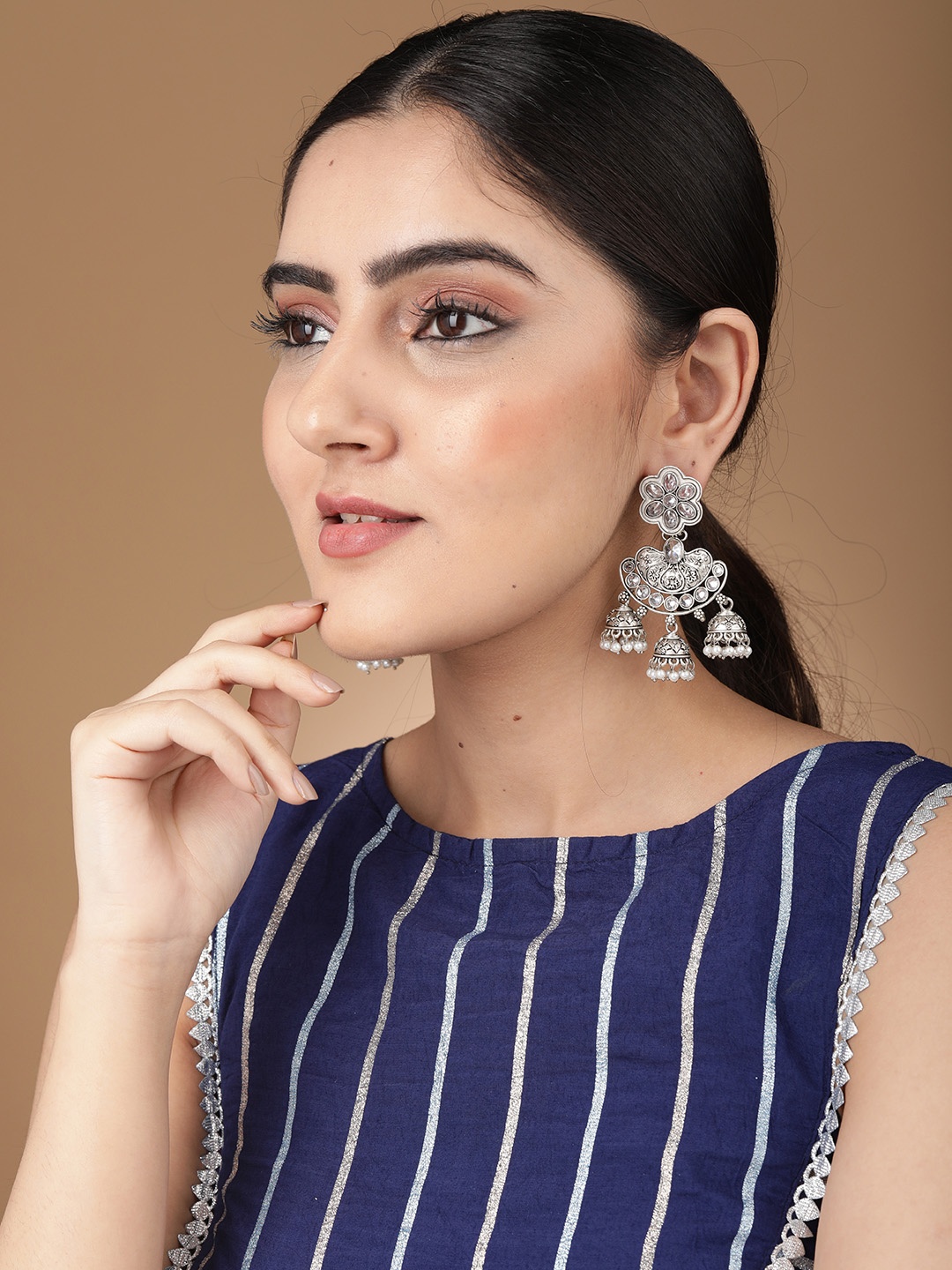 

Rubans Silver-Toned Dome Shaped Jhumkas Earrings