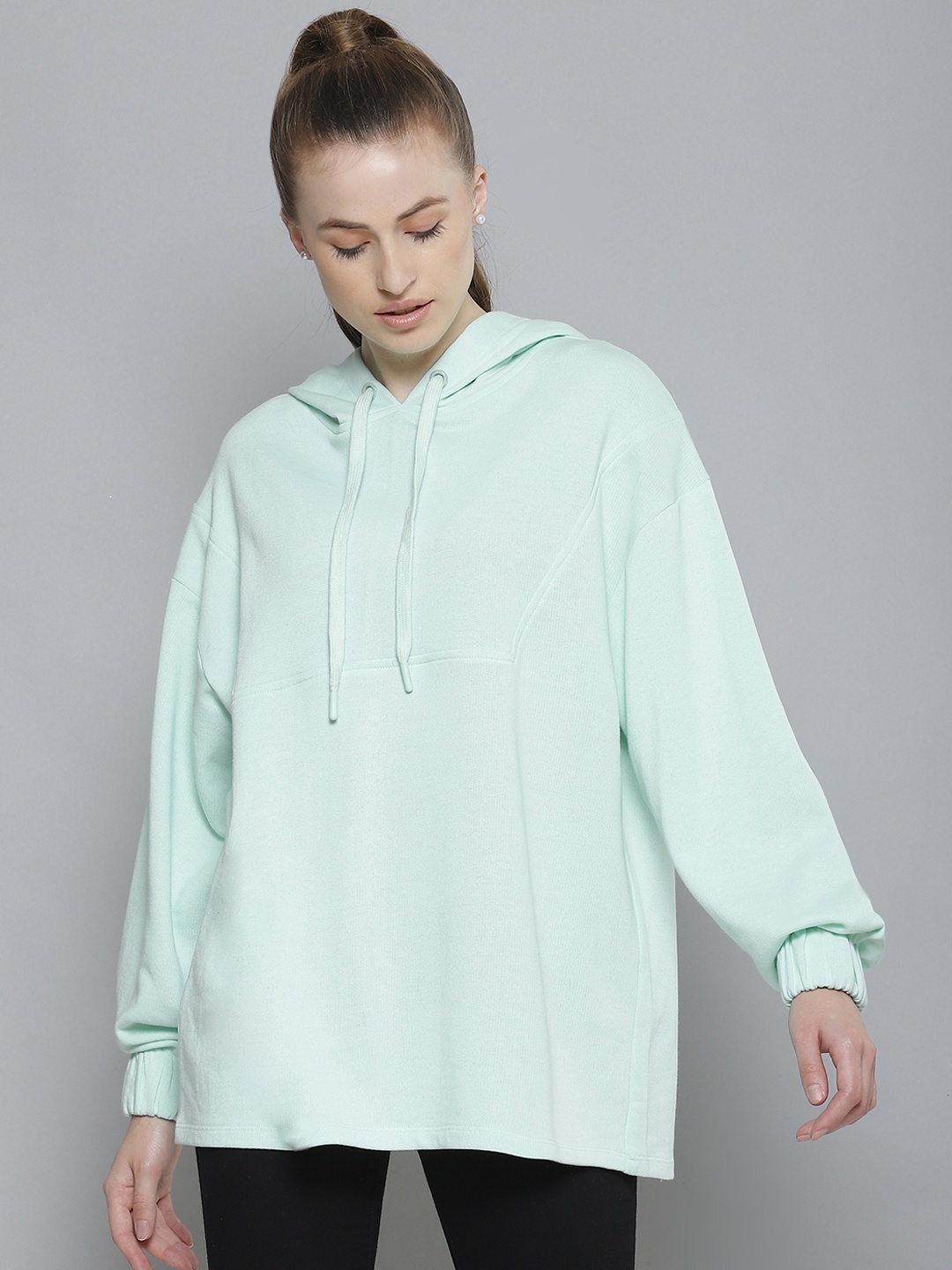 

Femella Women Green Oversized Yoke Hooded Longline Sweatshirt