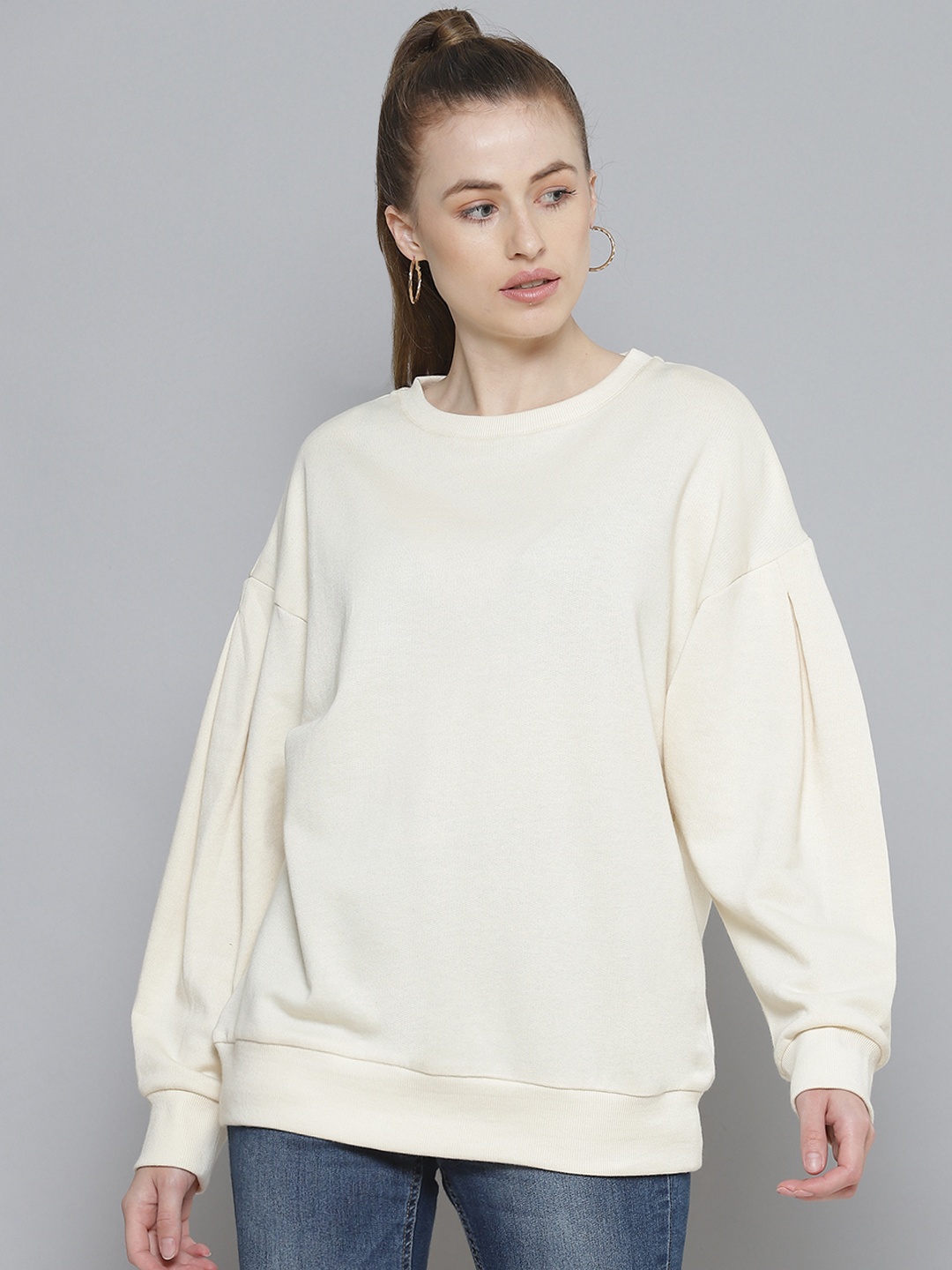 

Femella Women Off White Fleece Sweatshirt